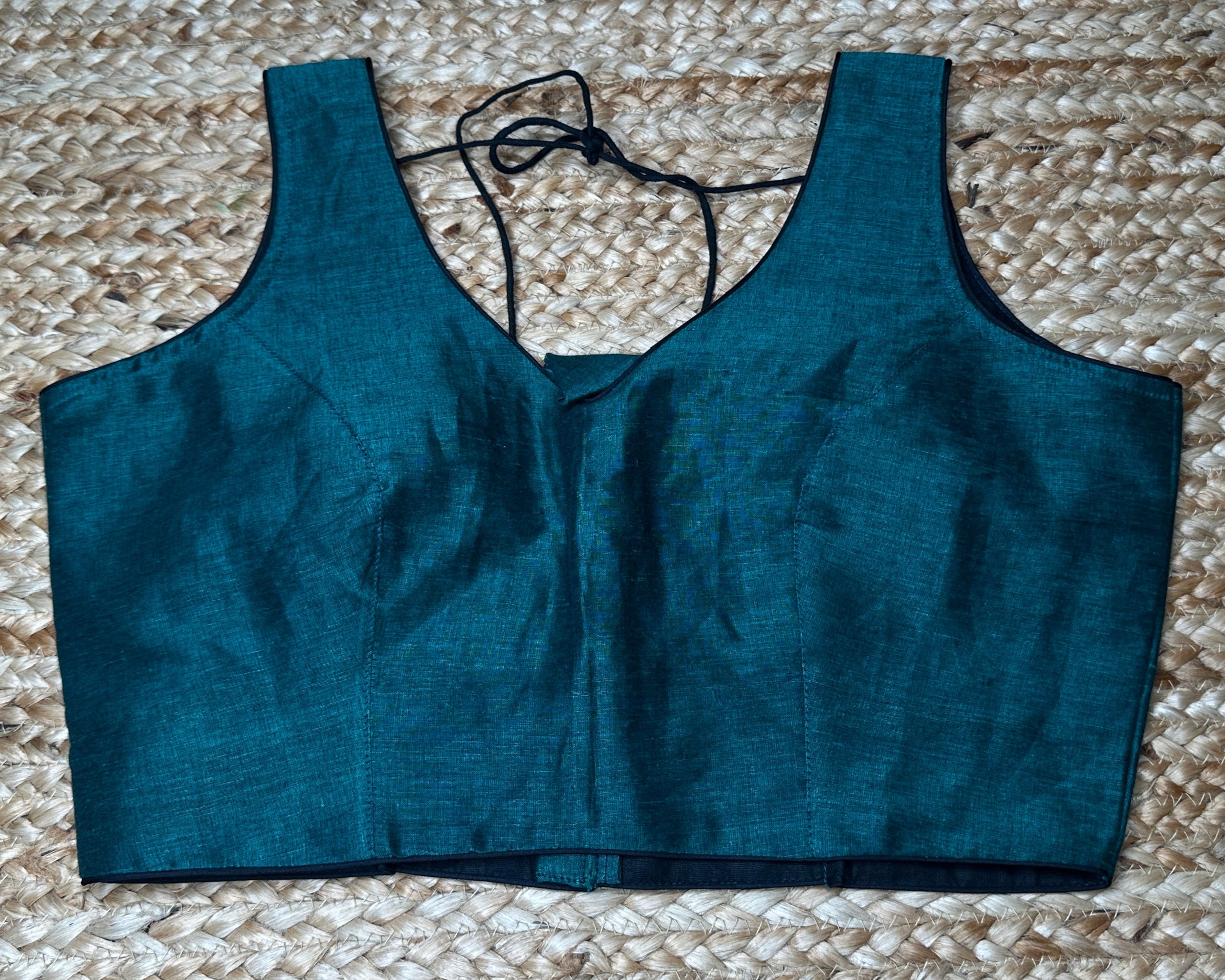 Green cotton sleeveless blouse