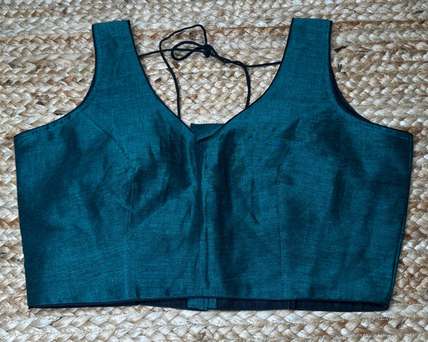 Green cotton sleeveless blouse