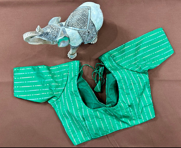Green silk blouse with gold and silver weave