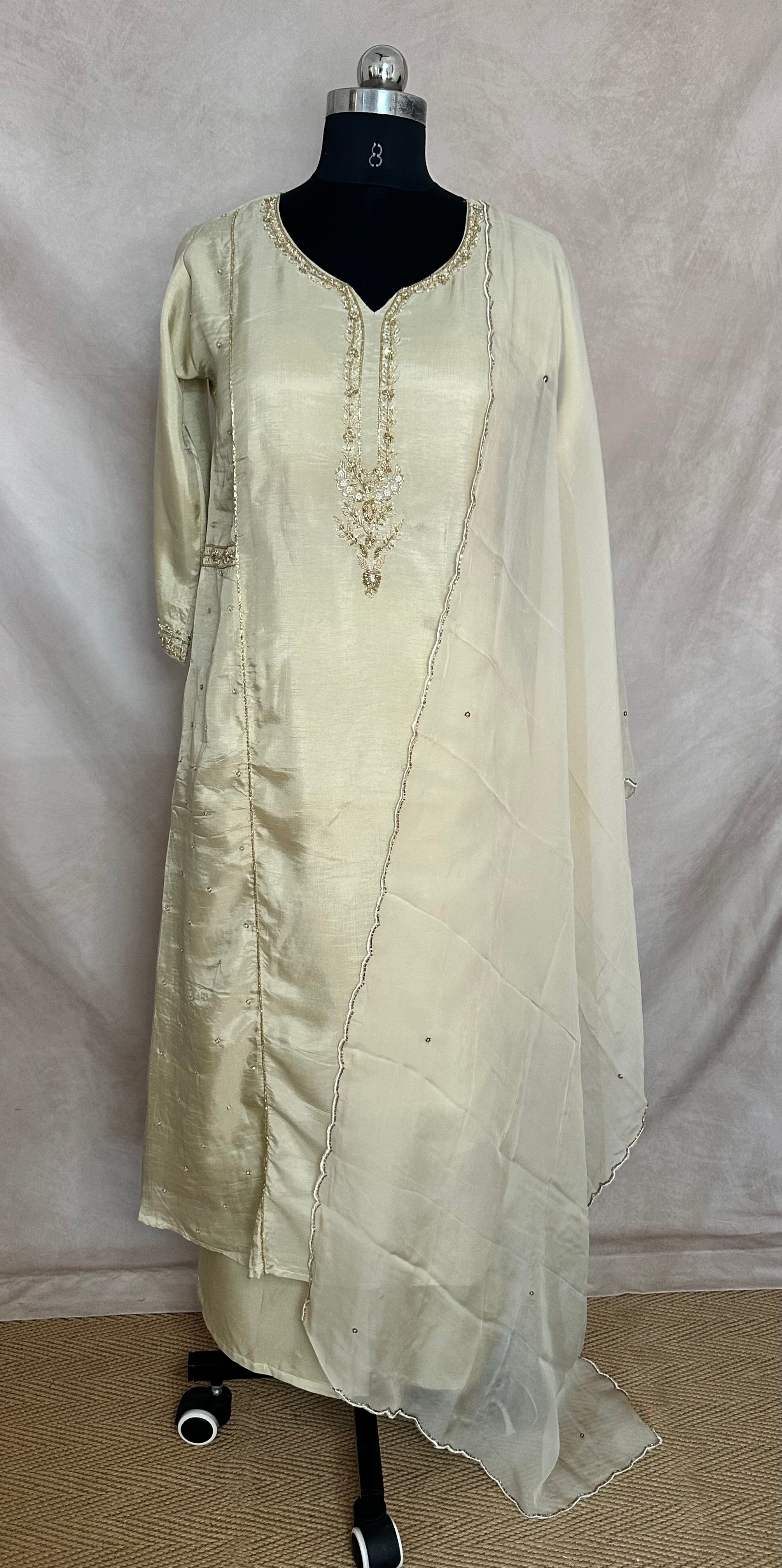 Cream color cotton silk kurti with handwork , comes with bottom and dupatta