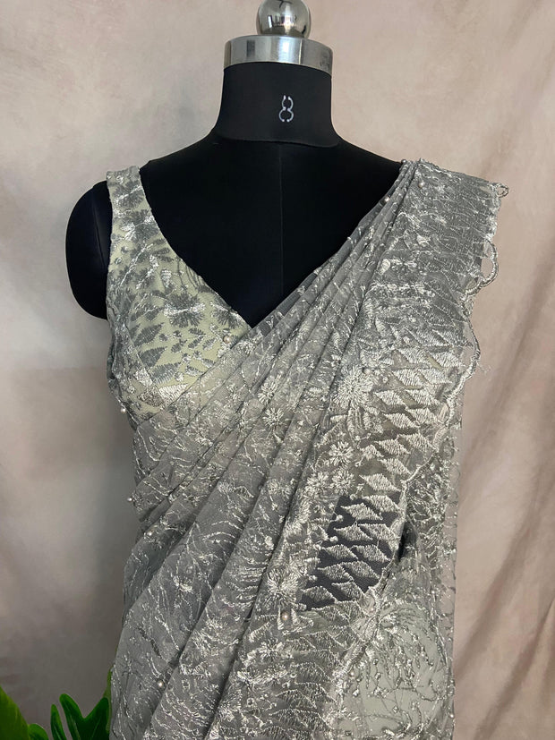 Pastel green lace fabric ready to wear saree with designer blouse