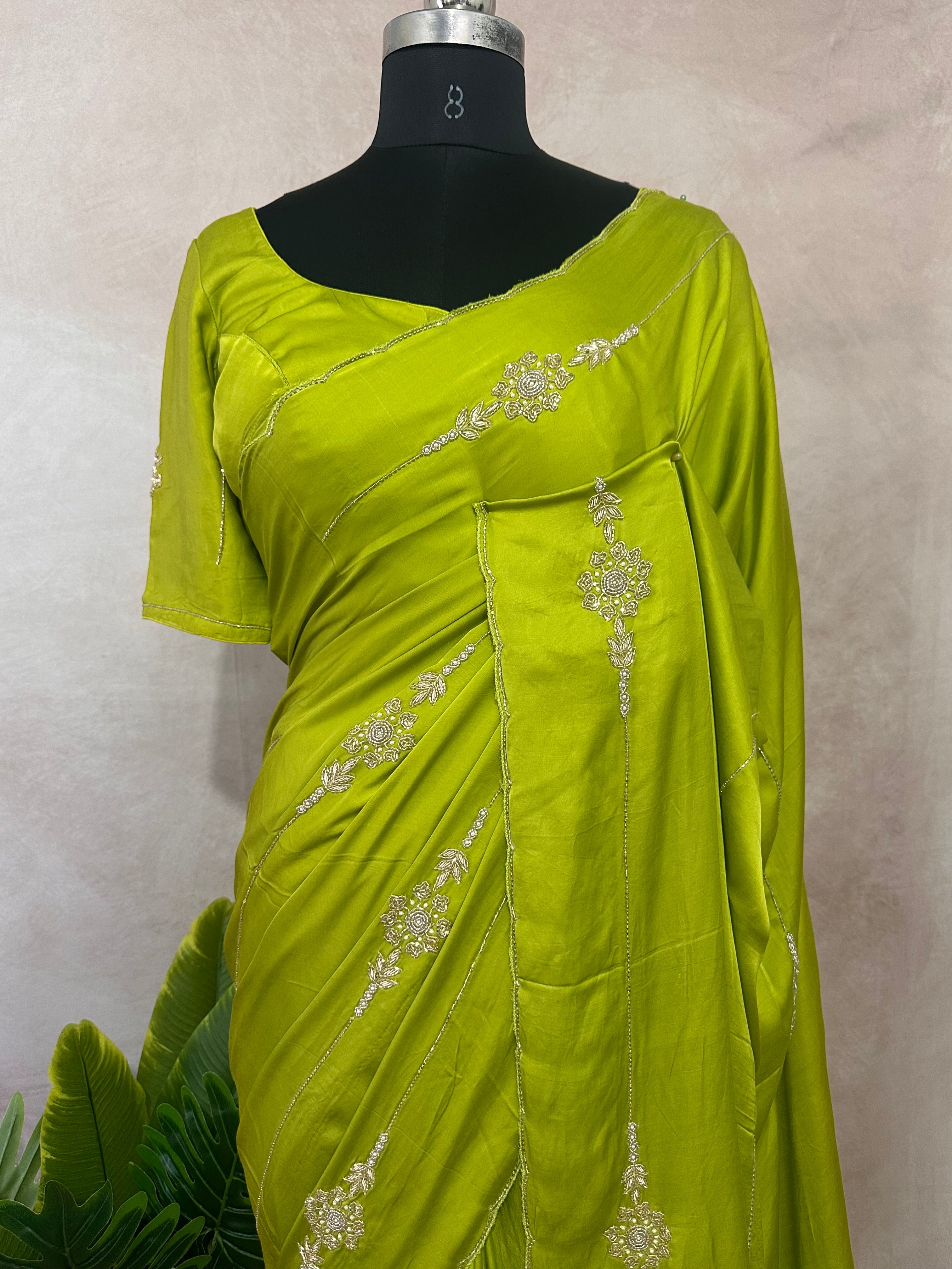Modal silk saree with hand embroidery and stitched blouse