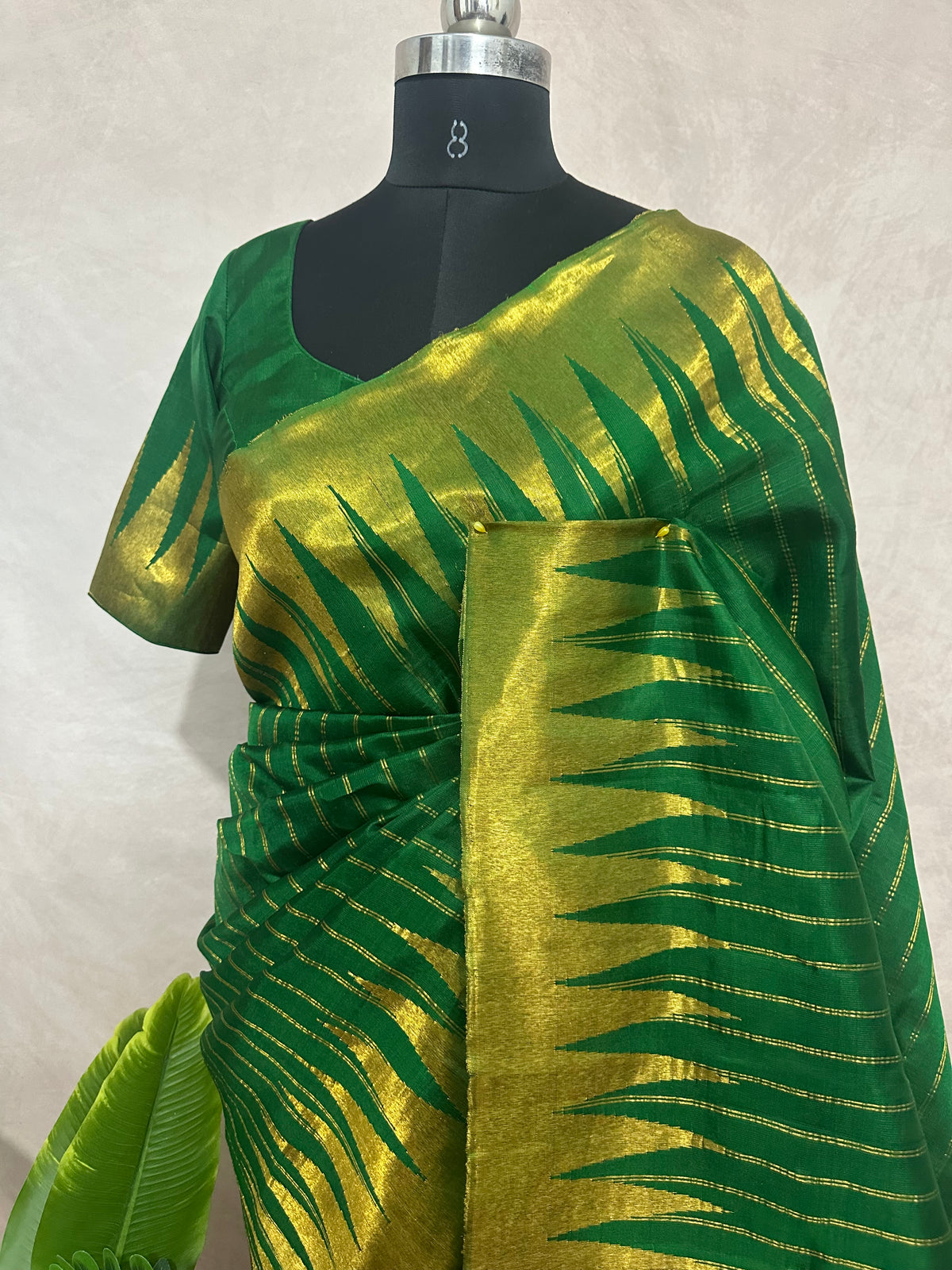 Handloom pure silk green gadwal silk saree with stitched blouse