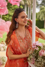 Coral color crepe silk top with flared bottom