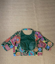 Green blouse with multi color print and highlighted with threadwork