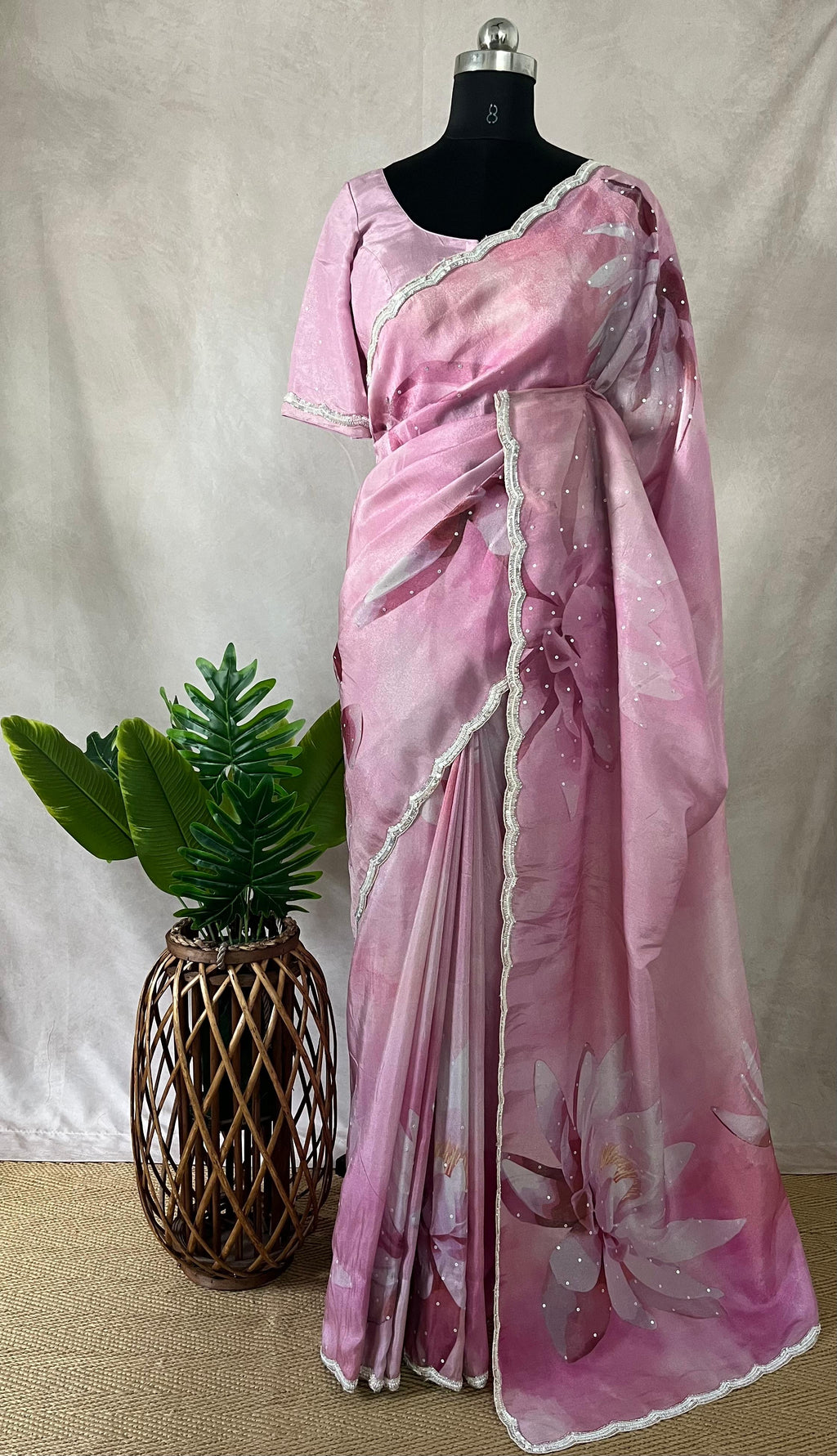 Tissue crepe silk saree with sequins border, stitched blouse