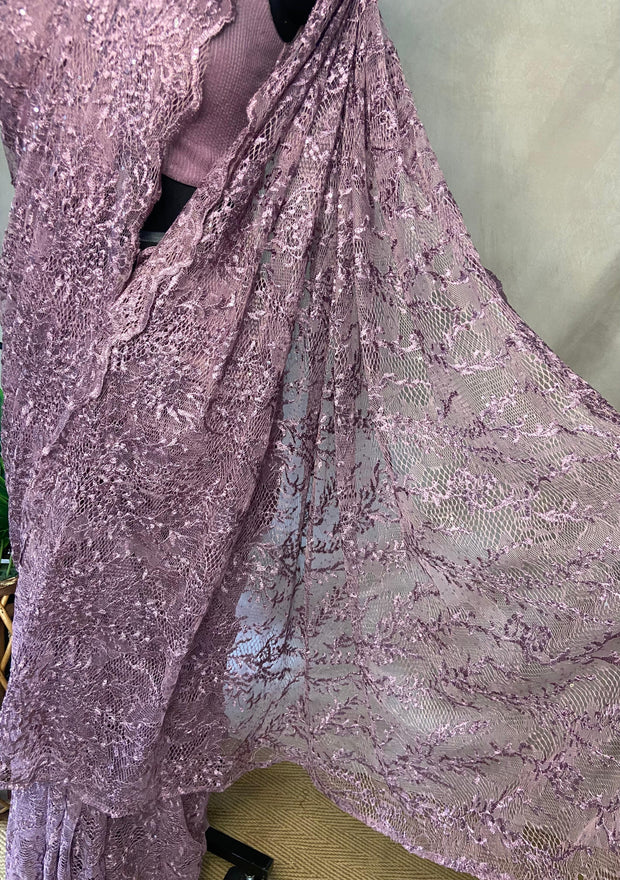 Lilac ready made saree in superior quality lace, with stitched blouse