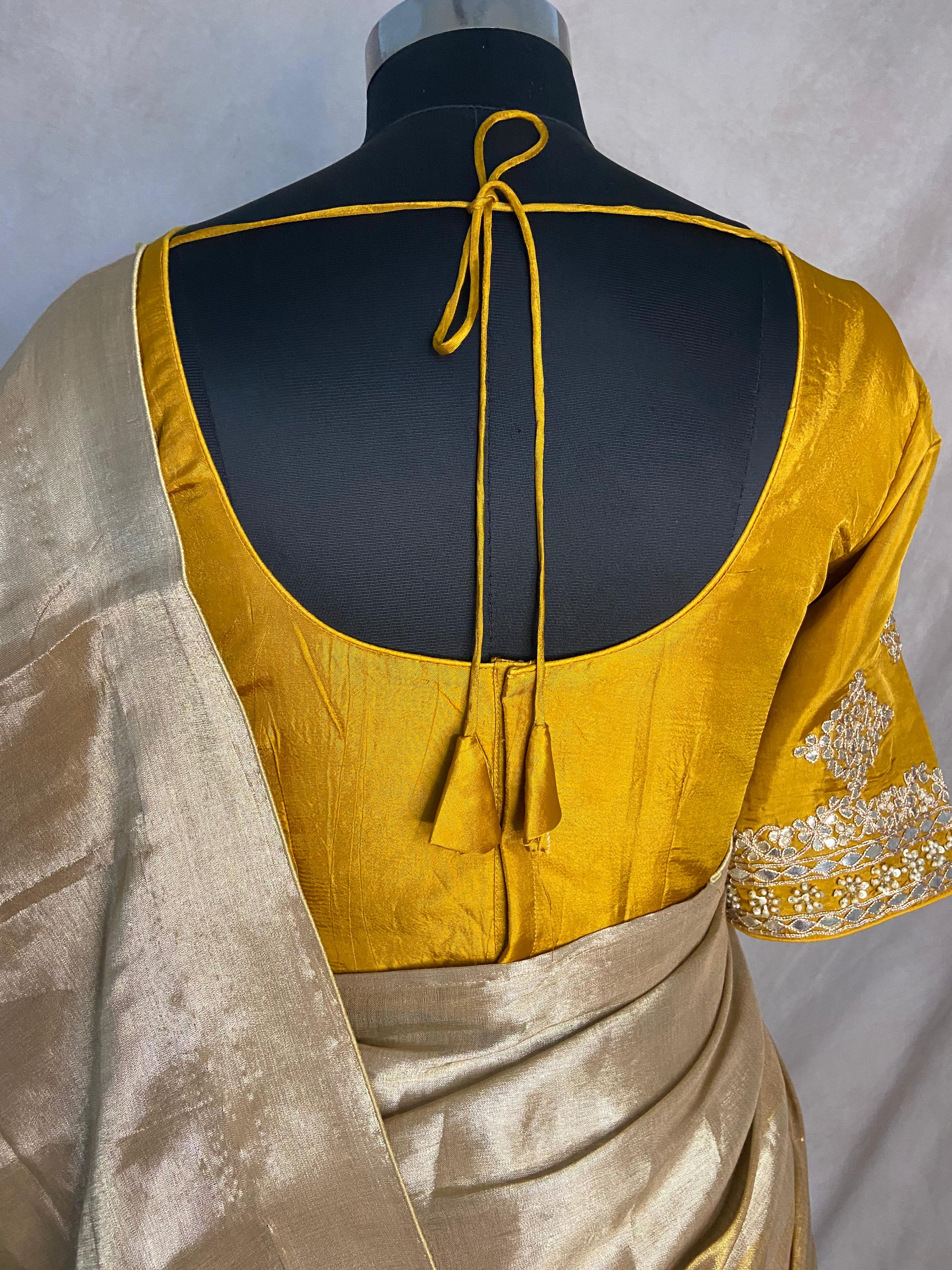 Tissue silk saree with designer blouse