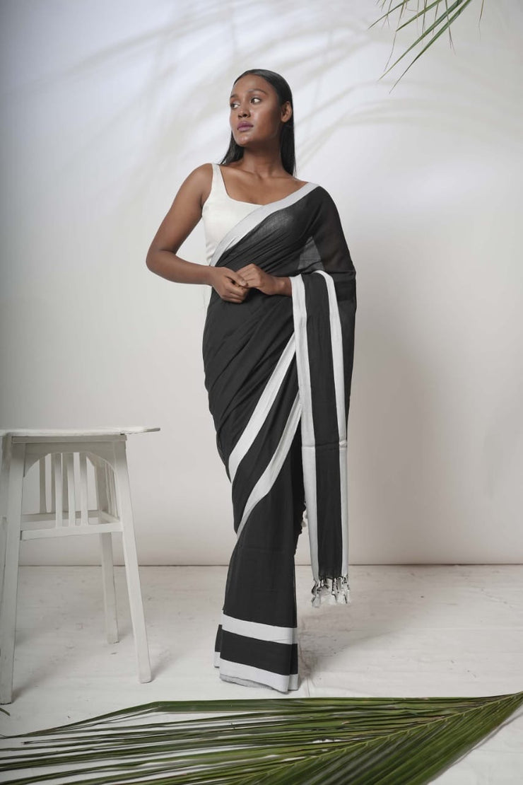 Black mulcotton saree with white satin border