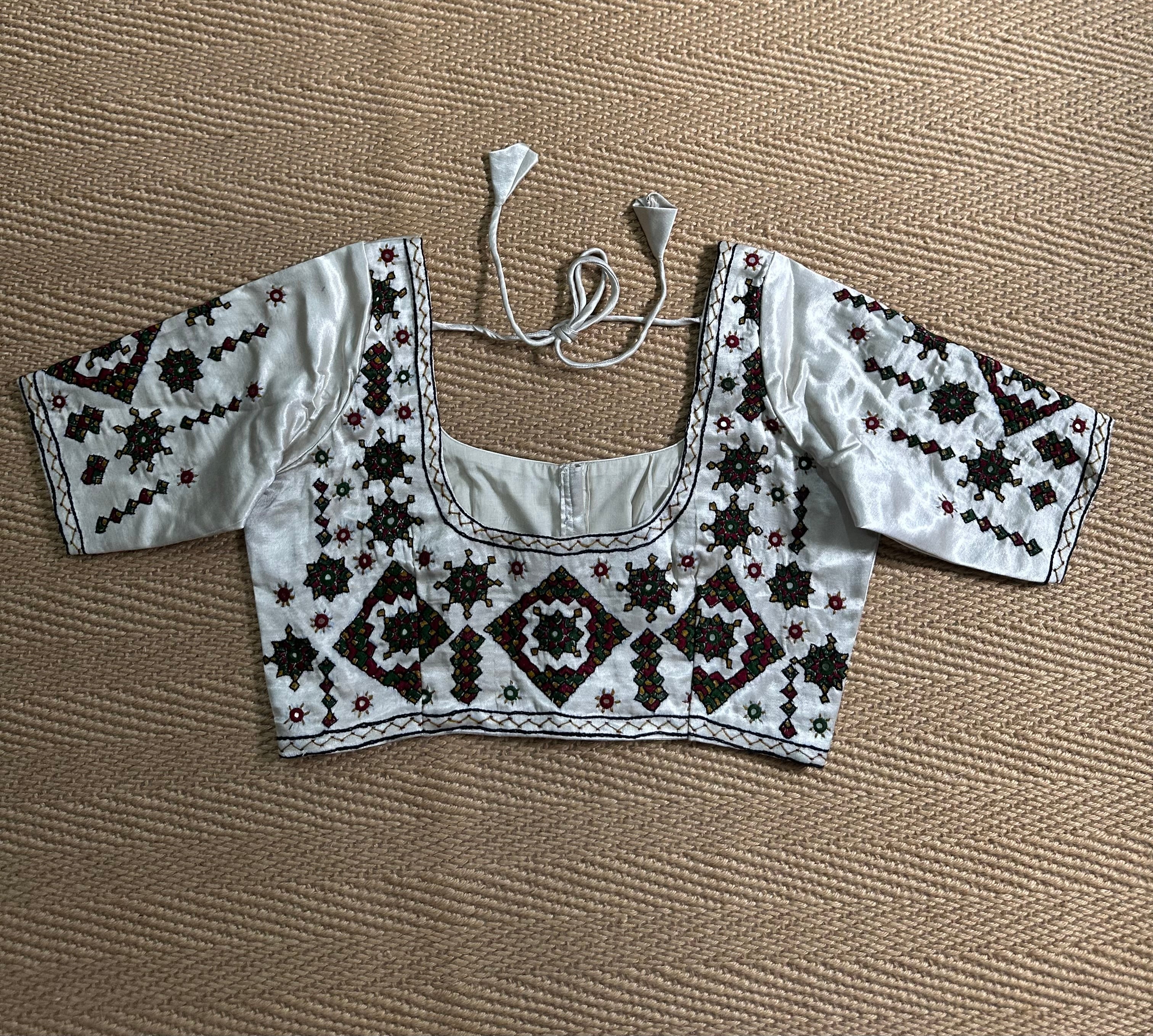 Light grey modal silk blouse with mirror work and hand Kutch Embroidery
