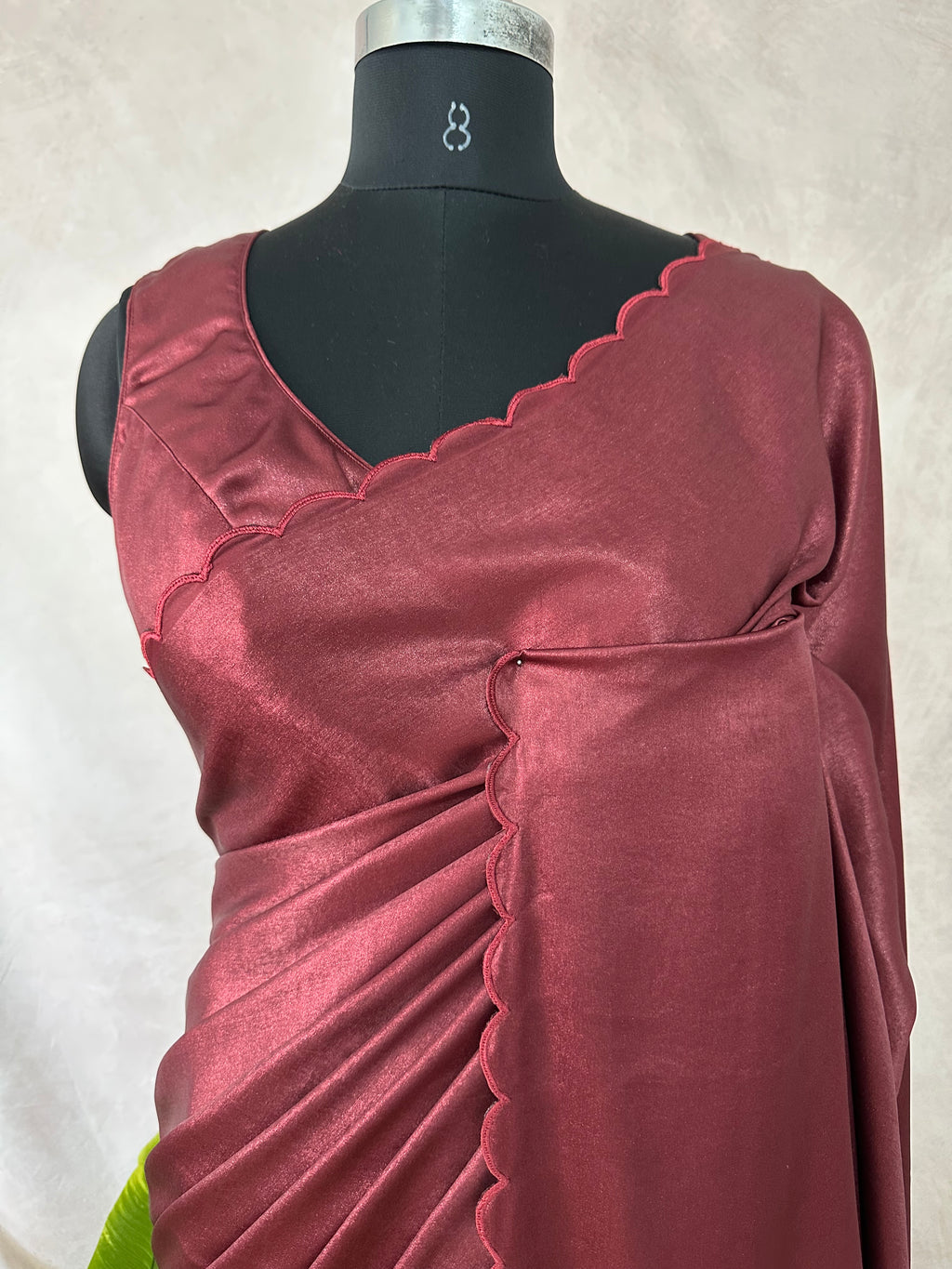 Shimmer crepe saree with scallop border, with stitched blouse