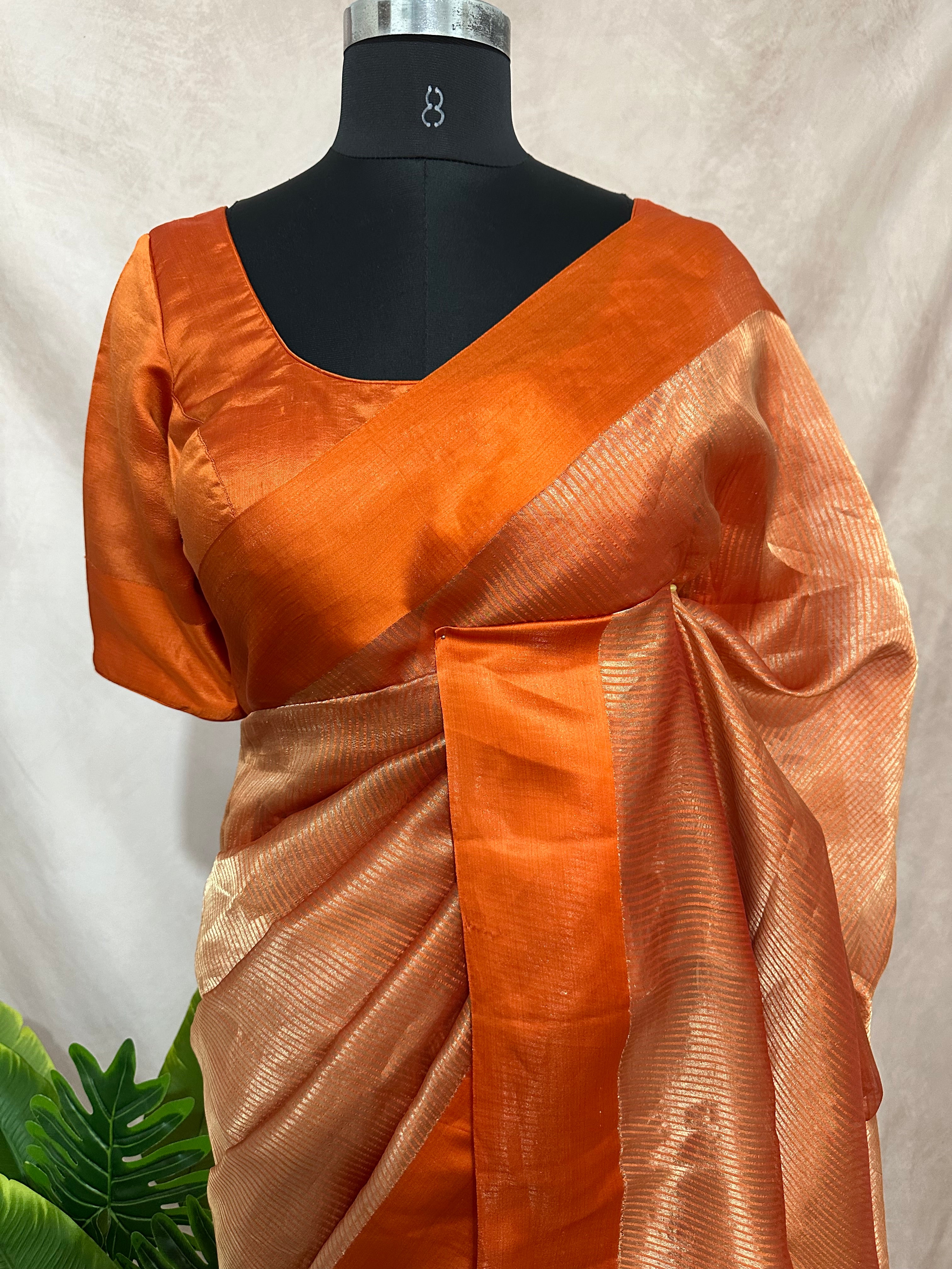 Orange stripe tissue silk saree with stitched blouse