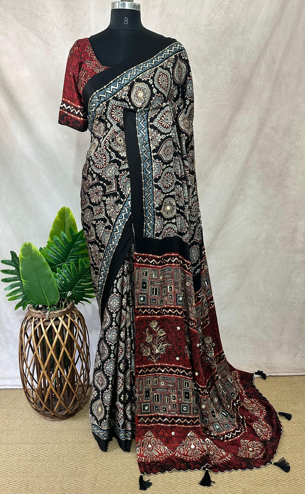 Designer Ajrakh modal silk saree with bead and mirroer handwork, stitched blouse