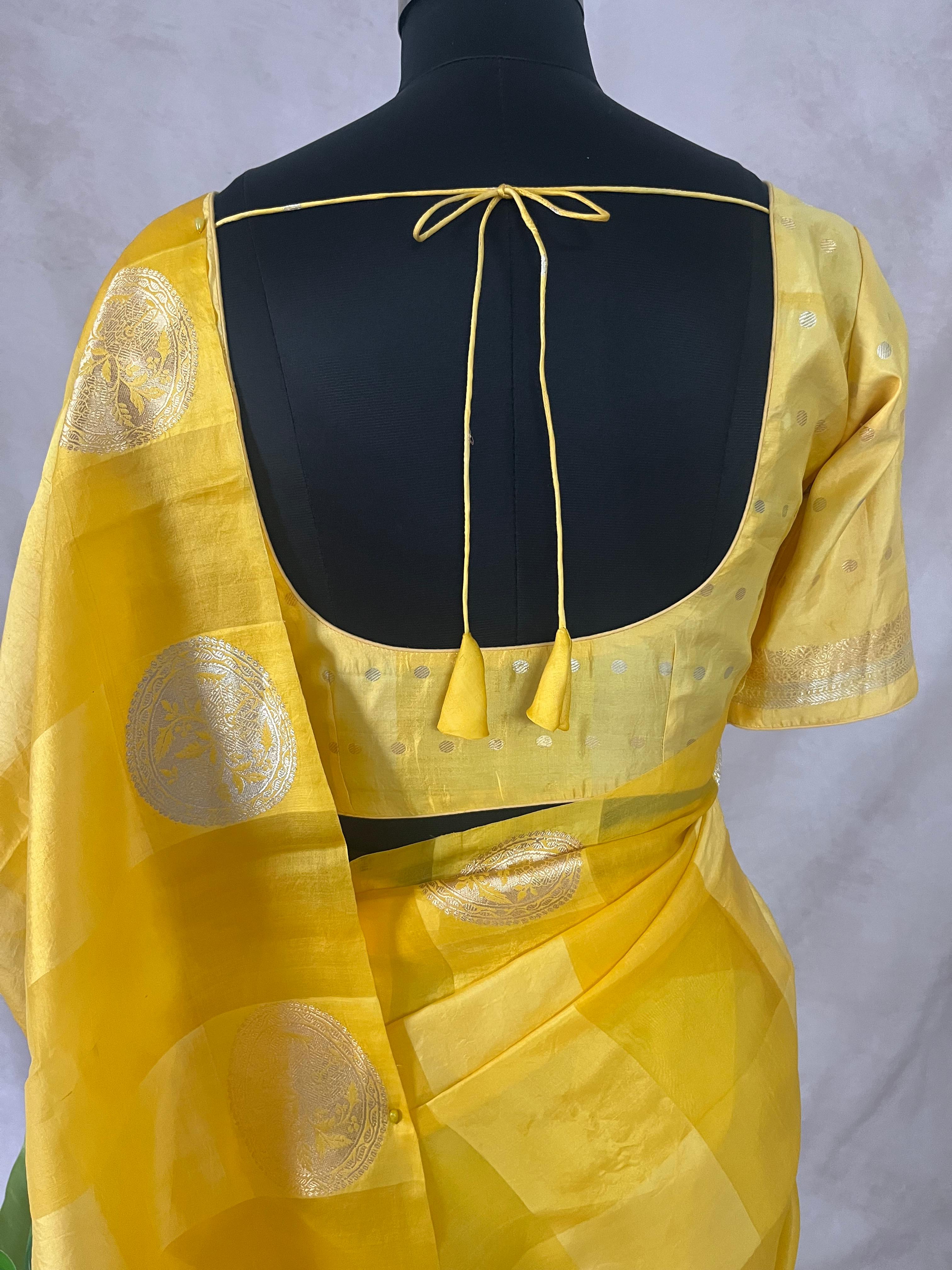 Yellow pure organza silk designer saree with stitched blouse