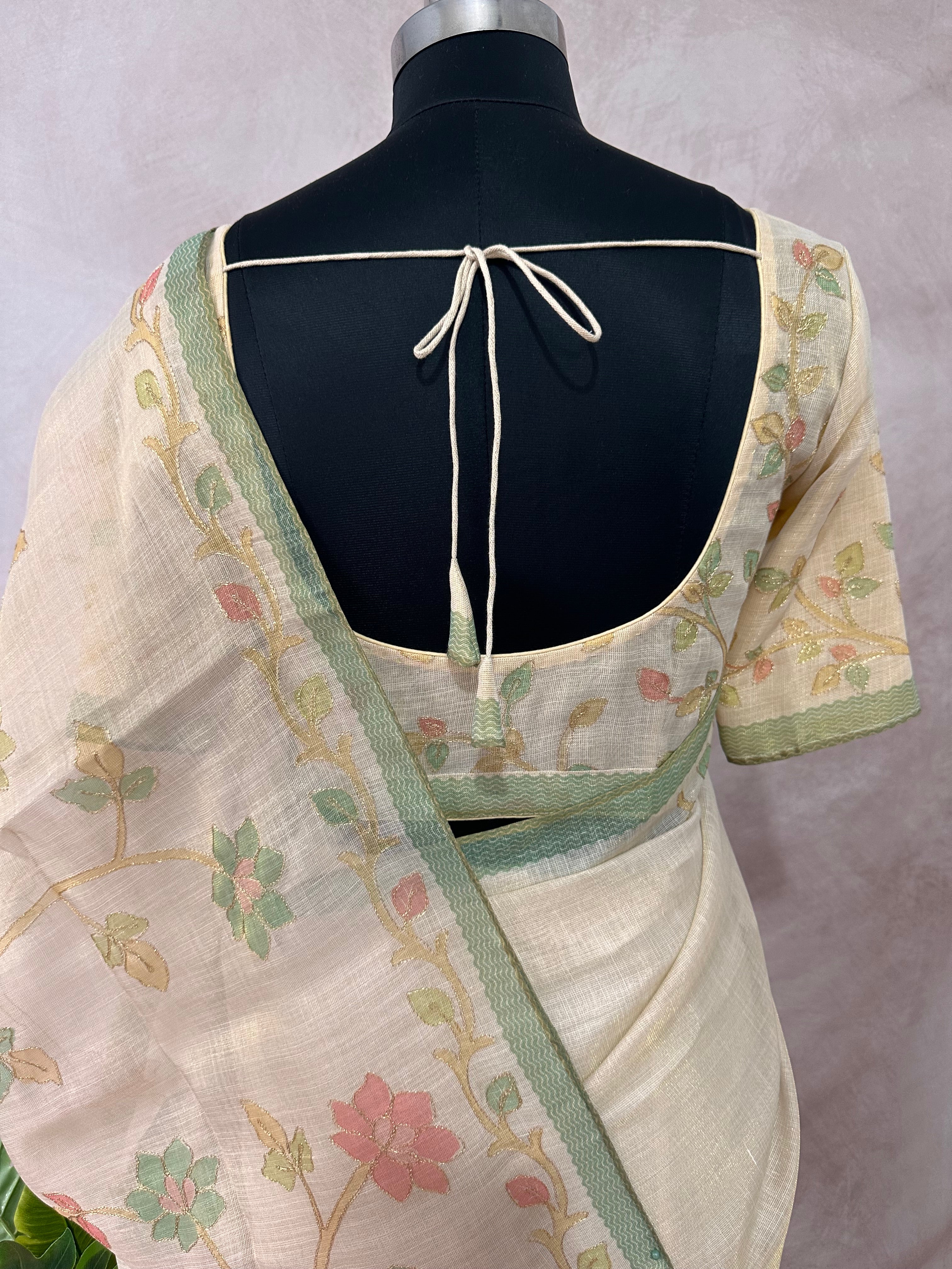 Printed Tissue linen saree with thread work, and stitched blouse