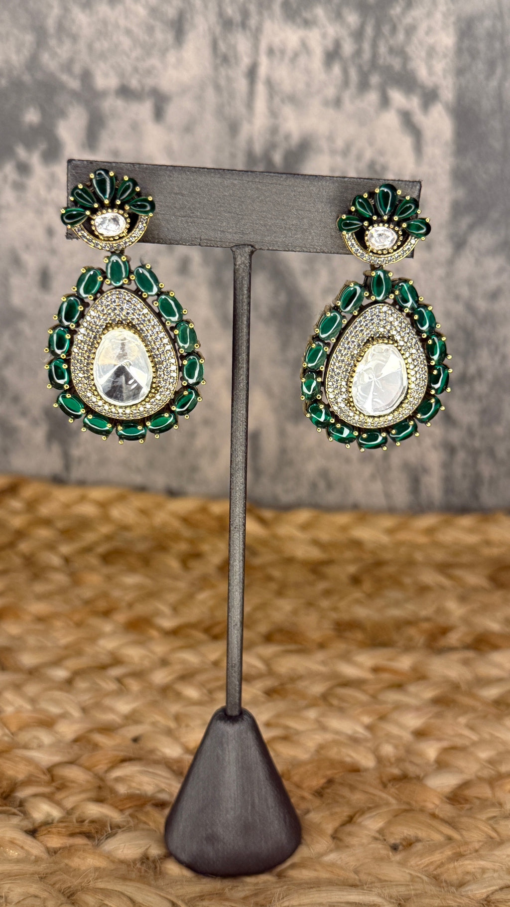 Earring with green stones