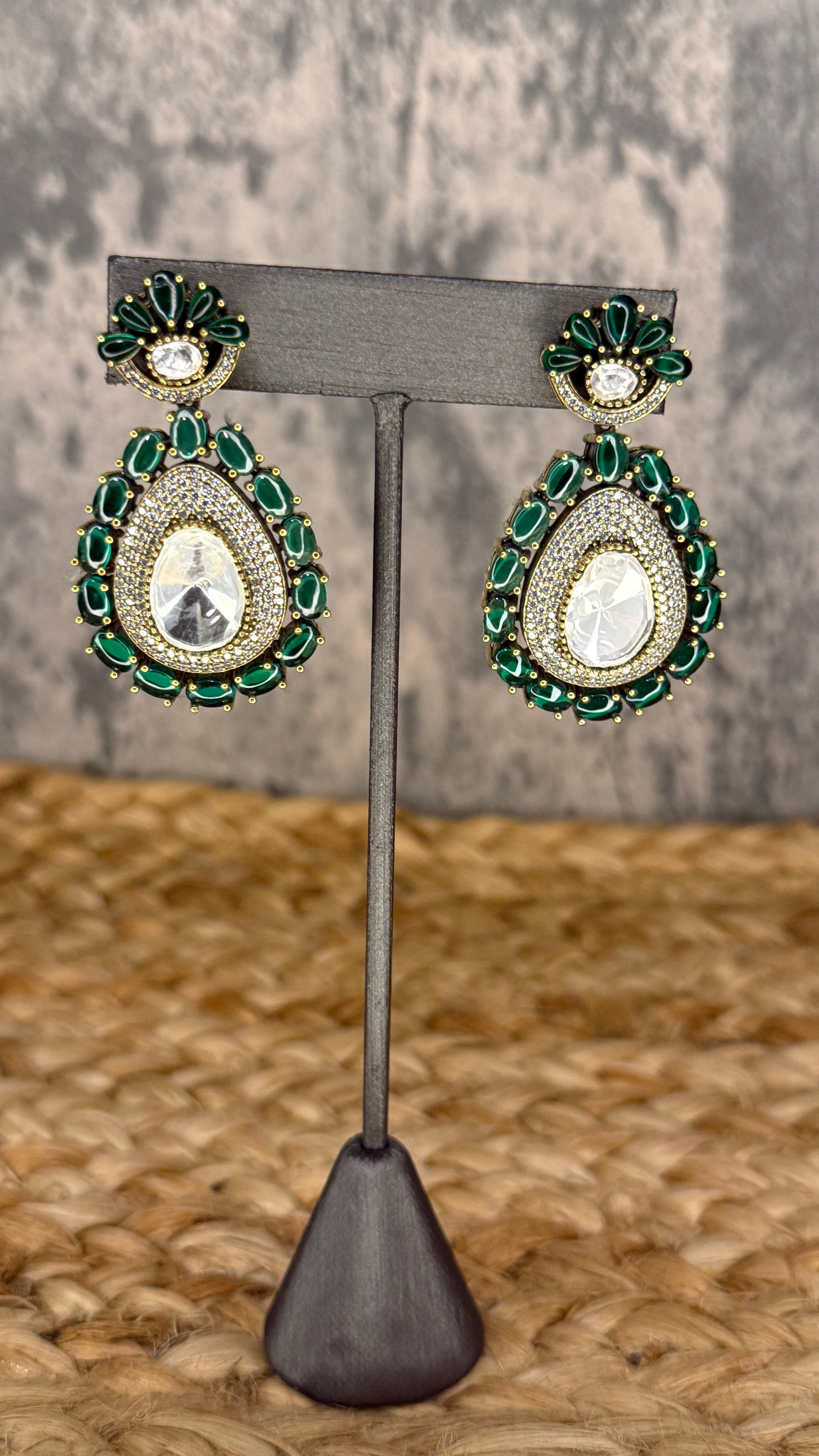 Earring with green stones