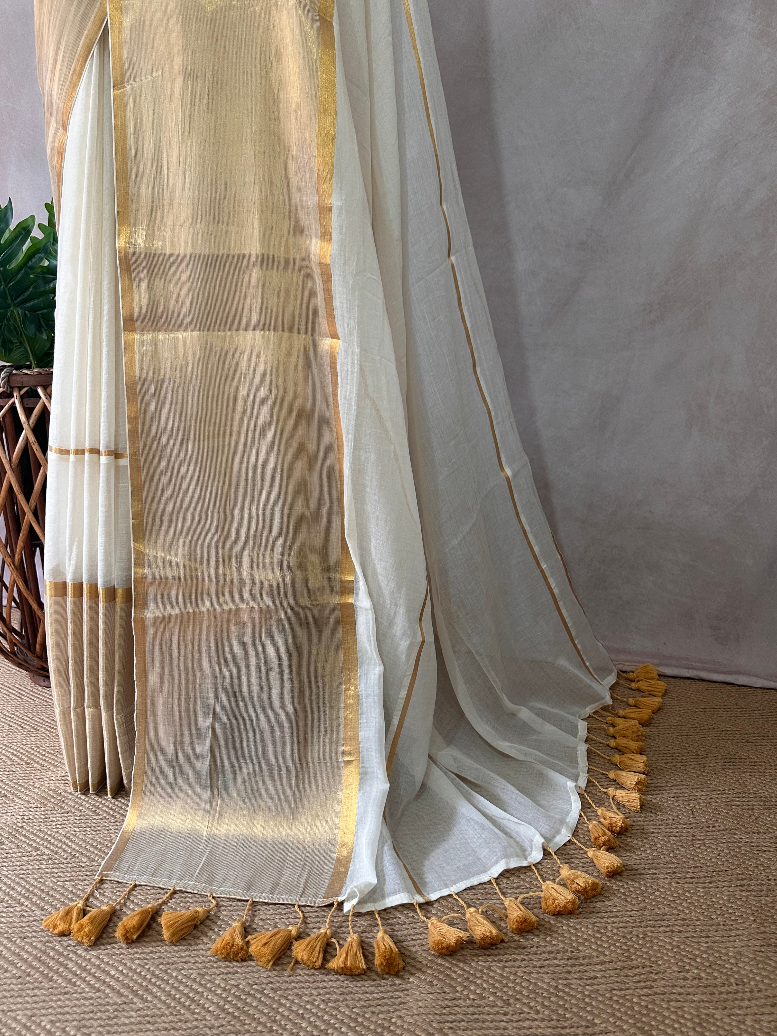 Gold 120 count mulcotton saree with zari lines