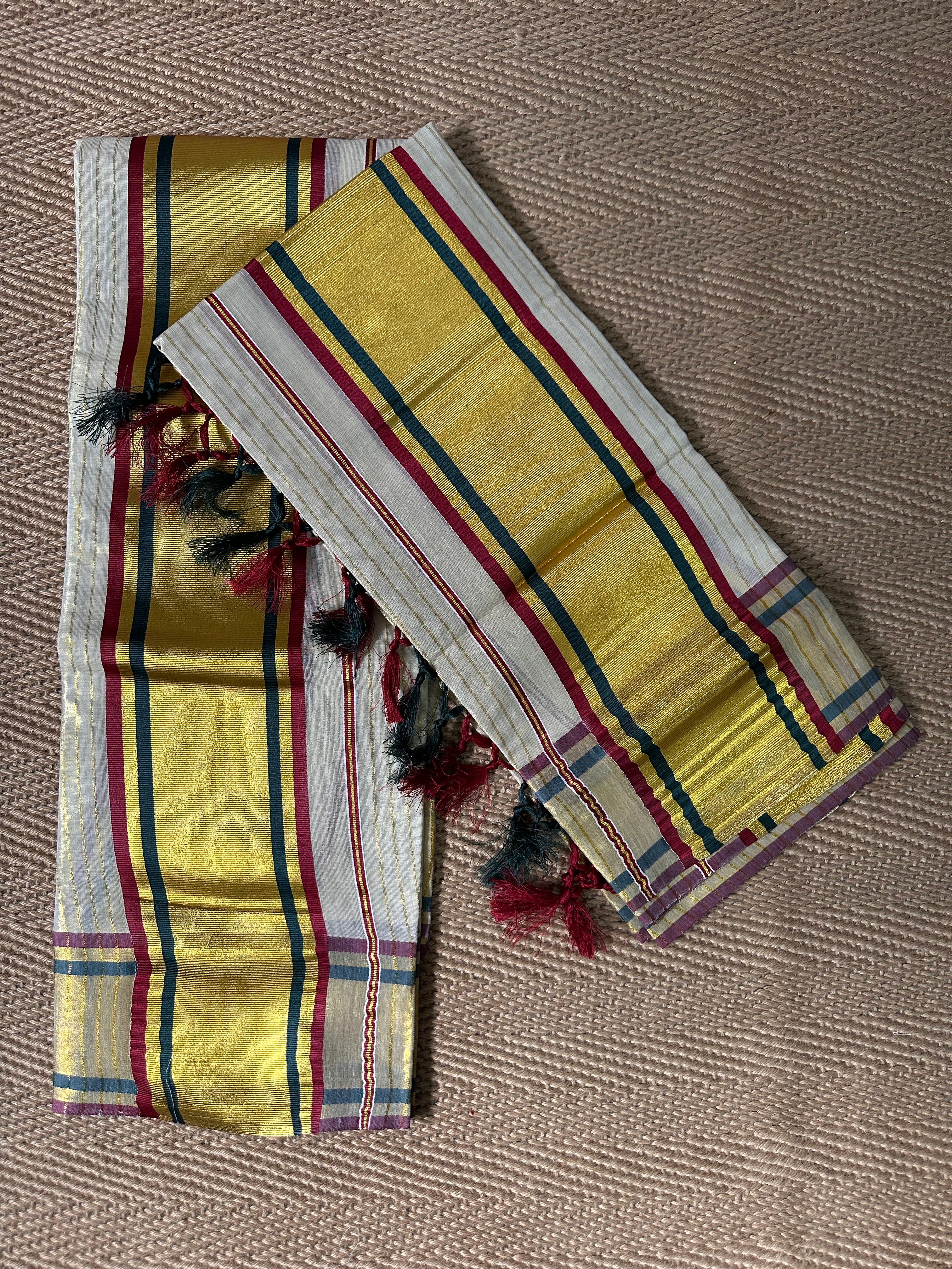 Green and red border tissue set mundu with gold stripes