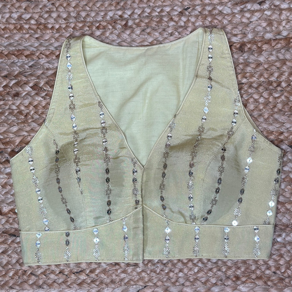 Yellow silk sleeveless blouse