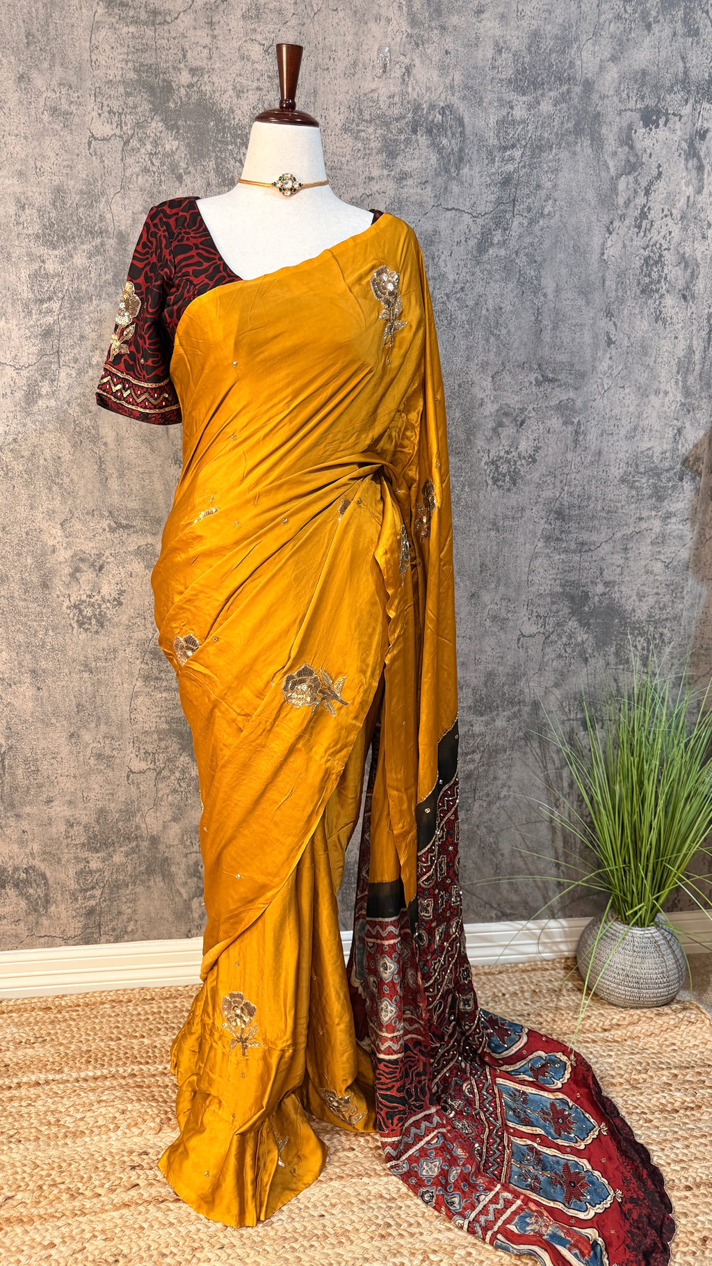 Modal silk saree with bead and mirror work , stitched blouse