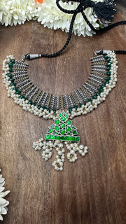 Dual tone necklace with green bead, No earring