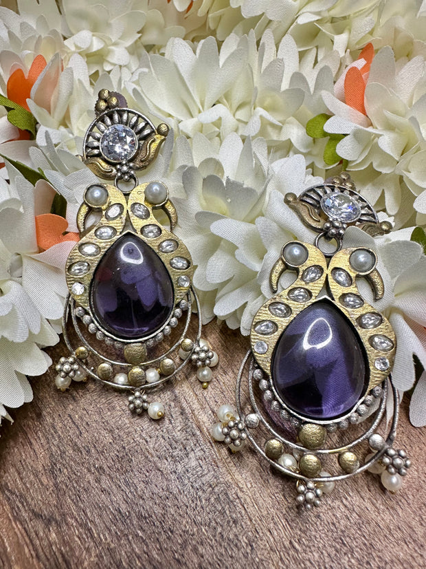 Dual tone earring with purple stone
