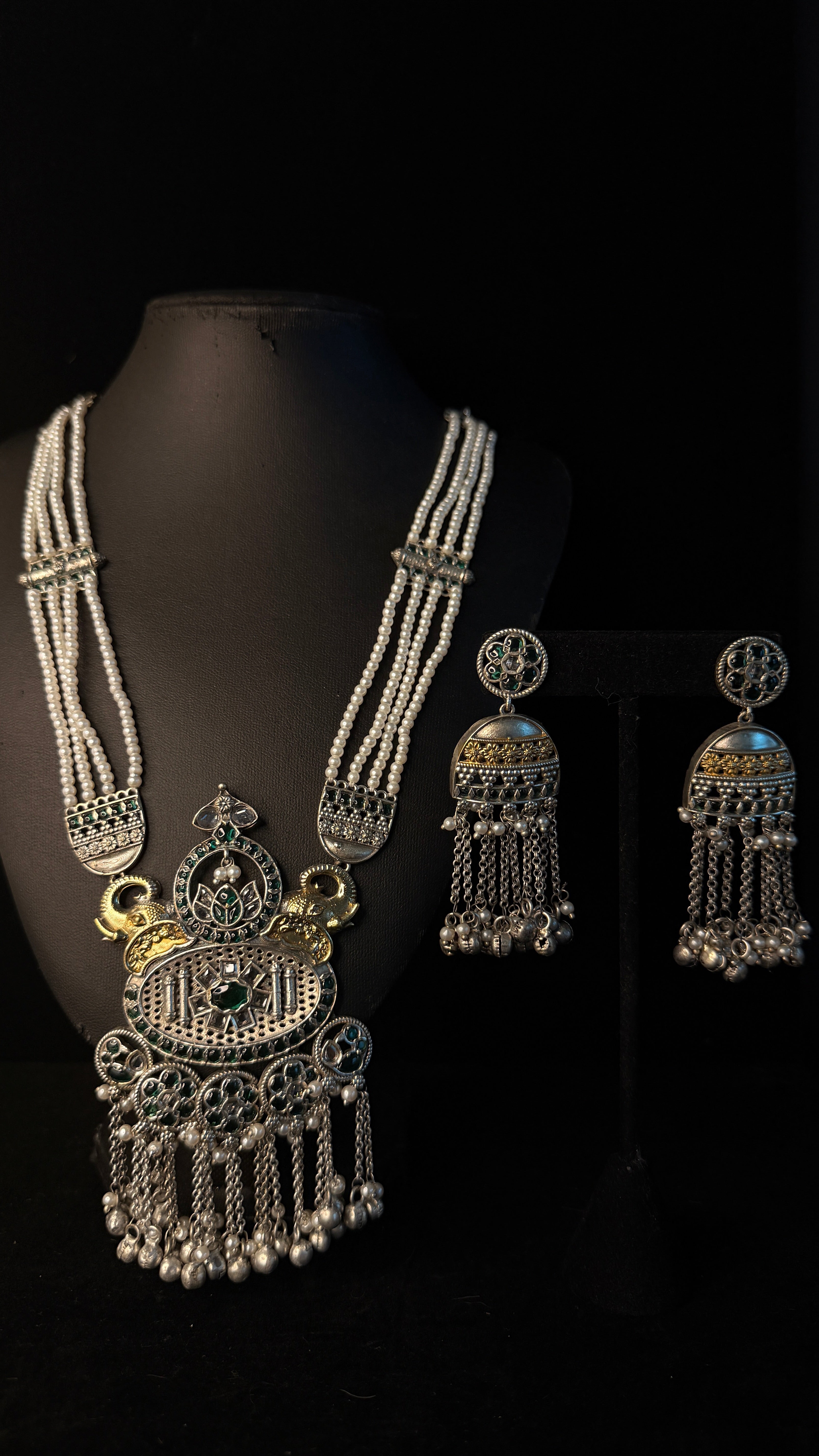 Dual tone necklace with green stones and earring