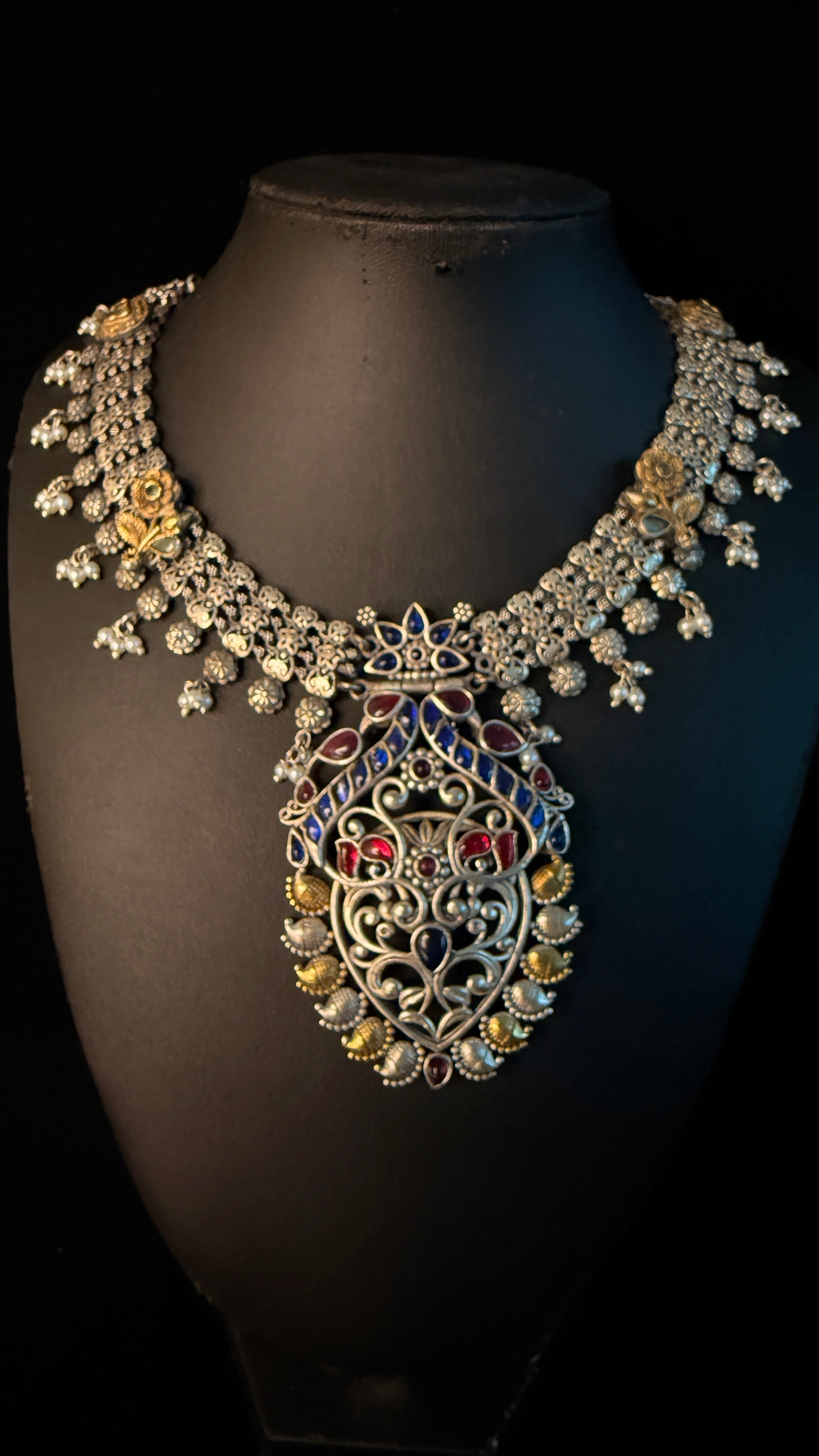Dual tone necklace with blue and pink stones and earring