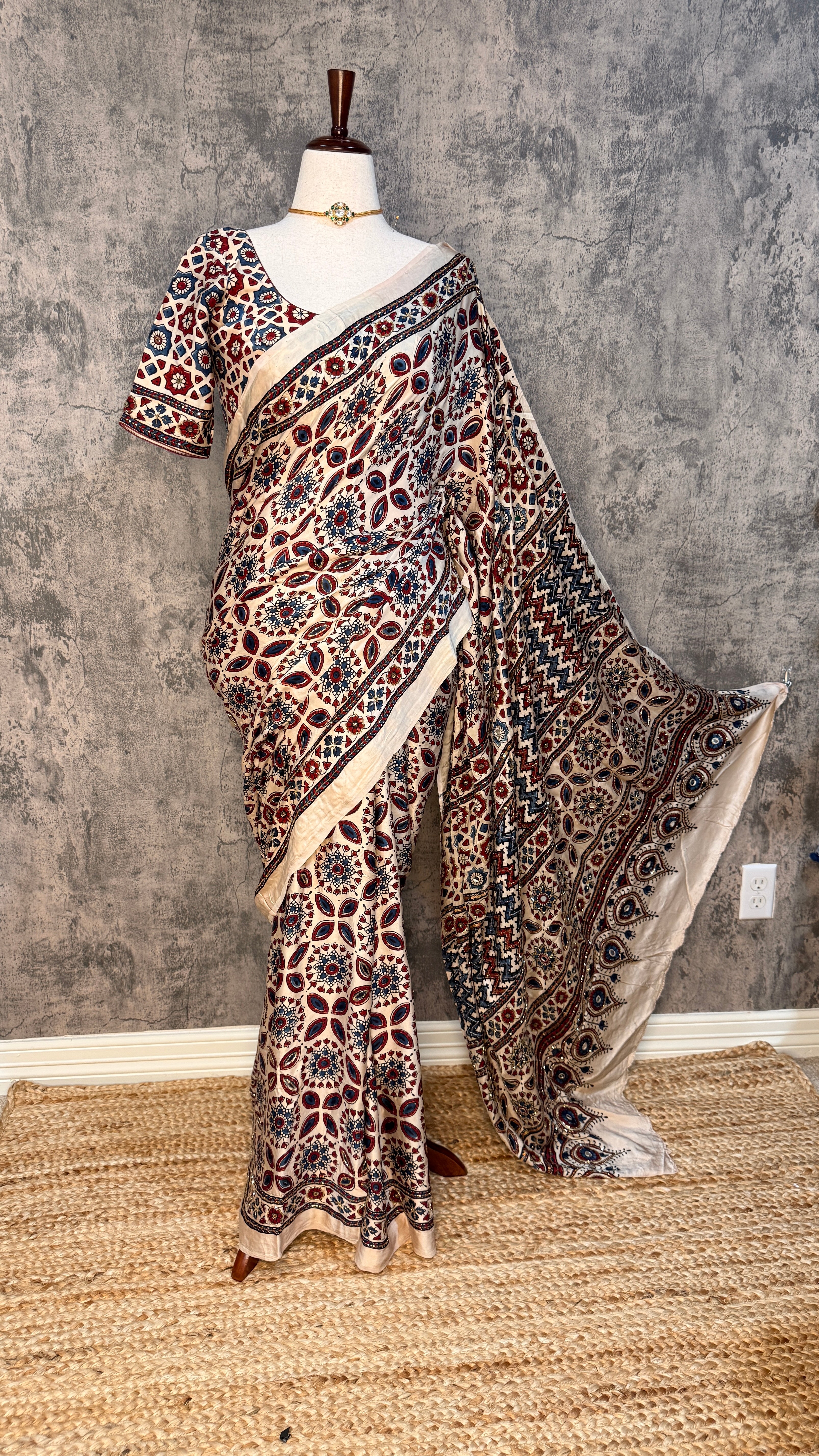 Modal silk saree with bead and mirror work , stitched blouse
