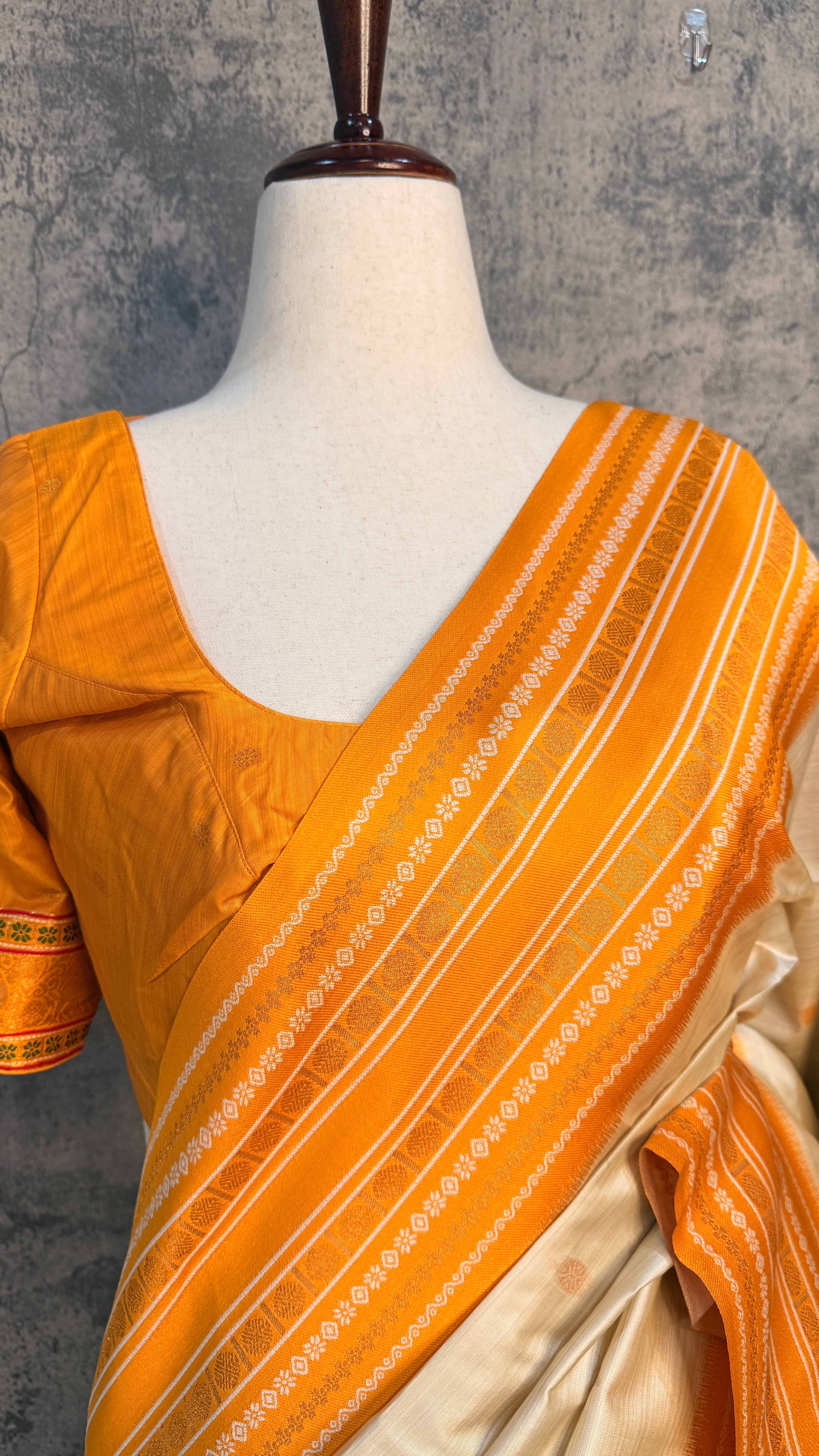 Asam silk saree with green border and stitched blouse