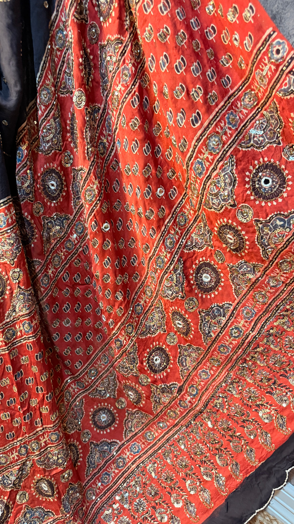 Modal silk saree with bead and mirror work , stitched blouse