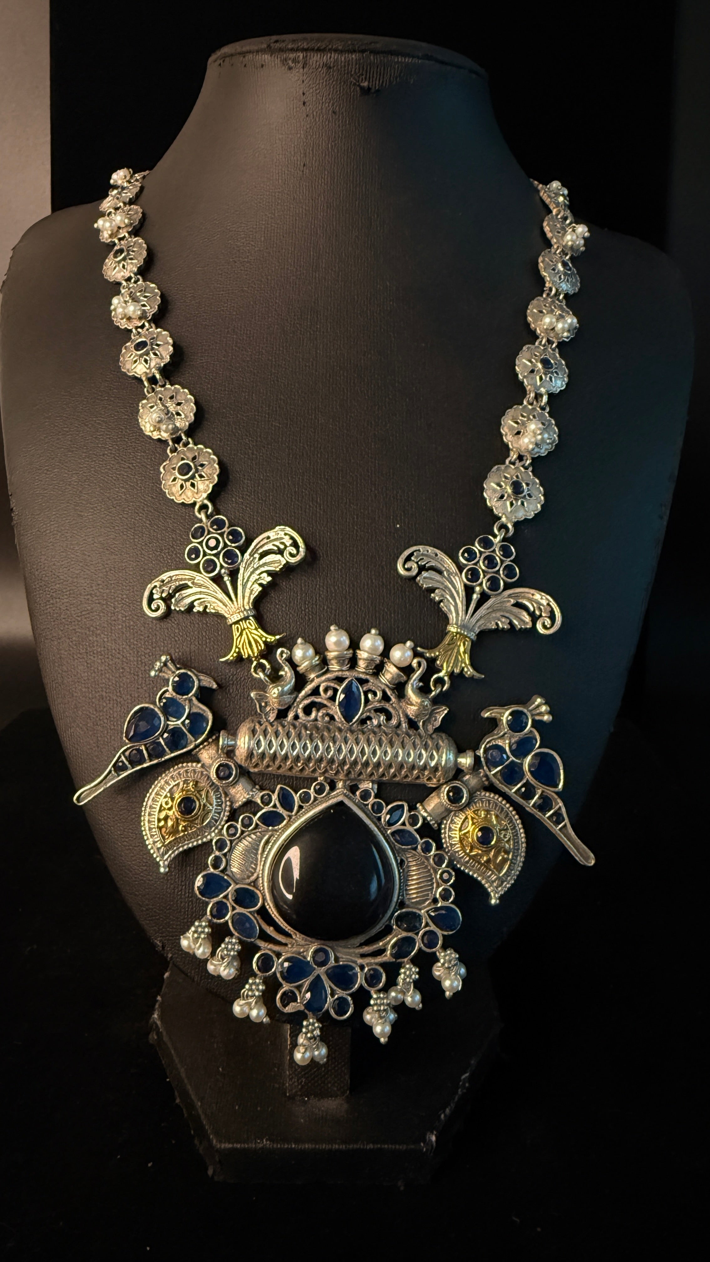 Dual tone necklace with blue and purple stones and earring