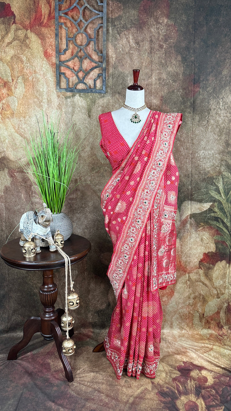Red dola silk saree with zardosi hand work , with stitched blouse
