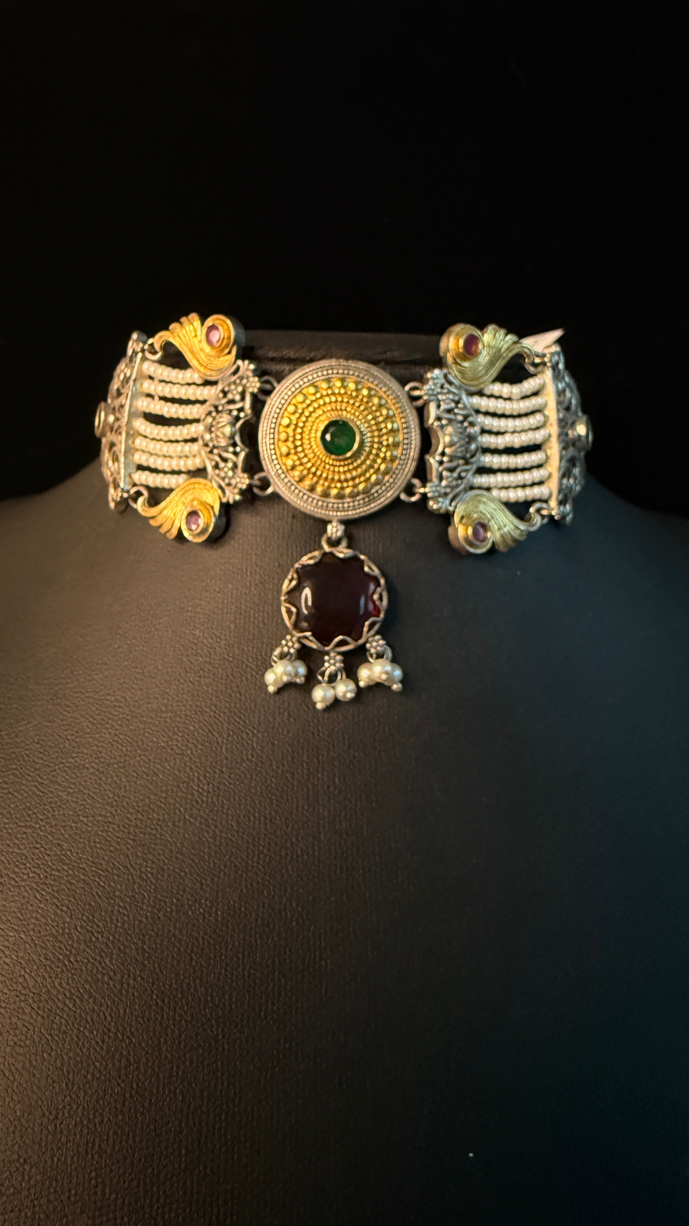 Dual tone choker with green and pink stone