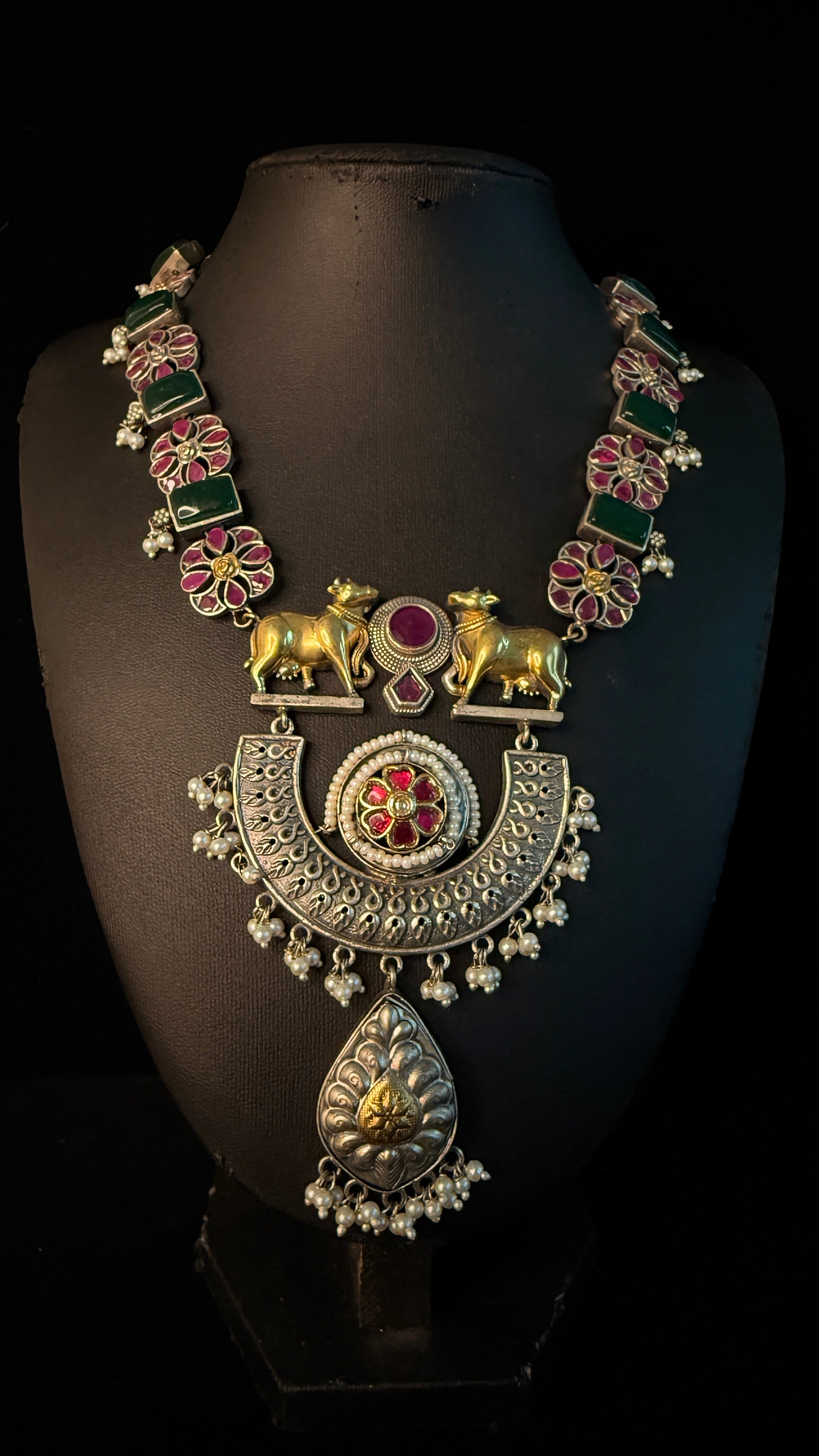 Dual tone necklace with blue and pink stones and earring
