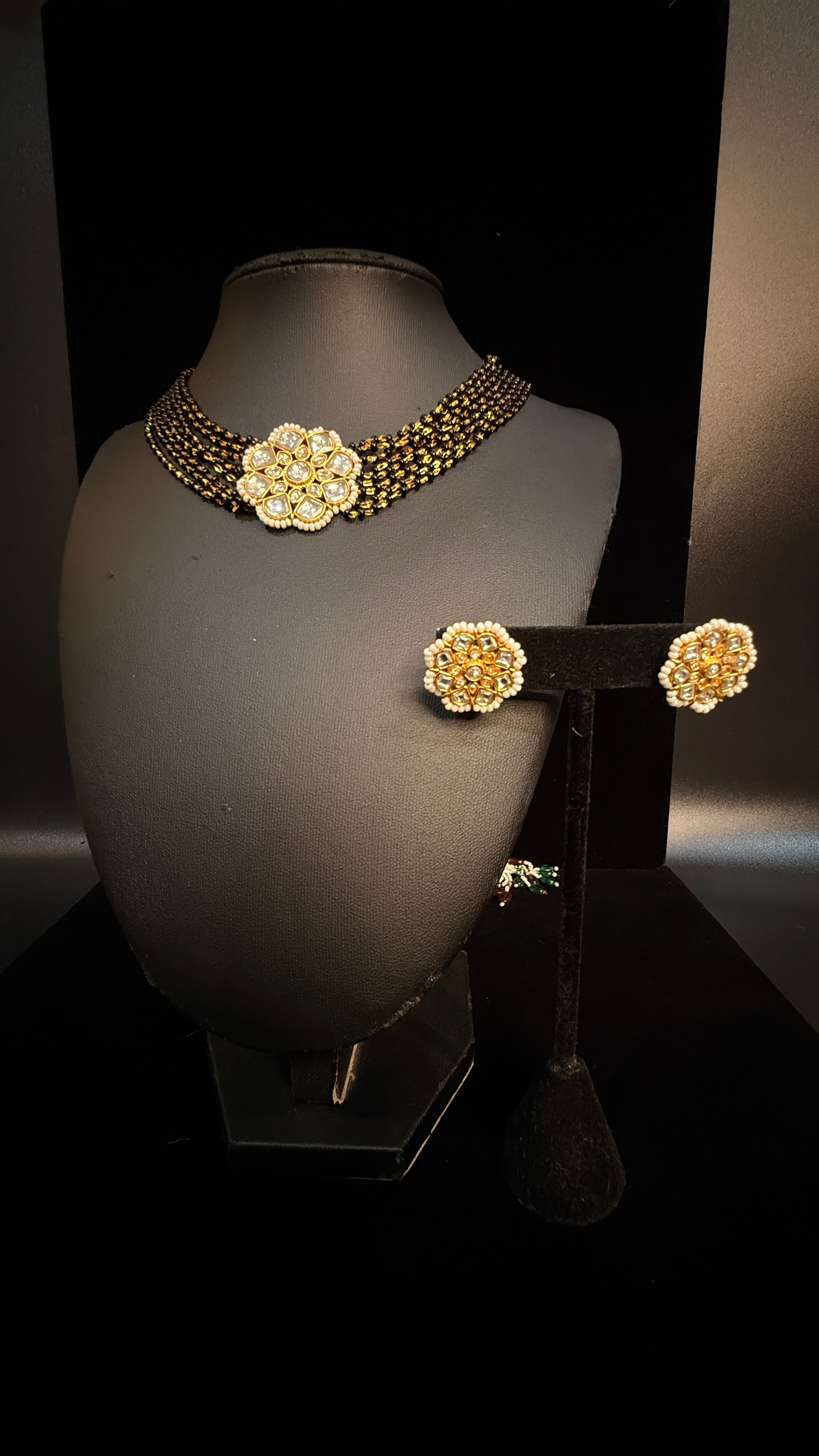 Black beads choker with kundan pendent and earring
