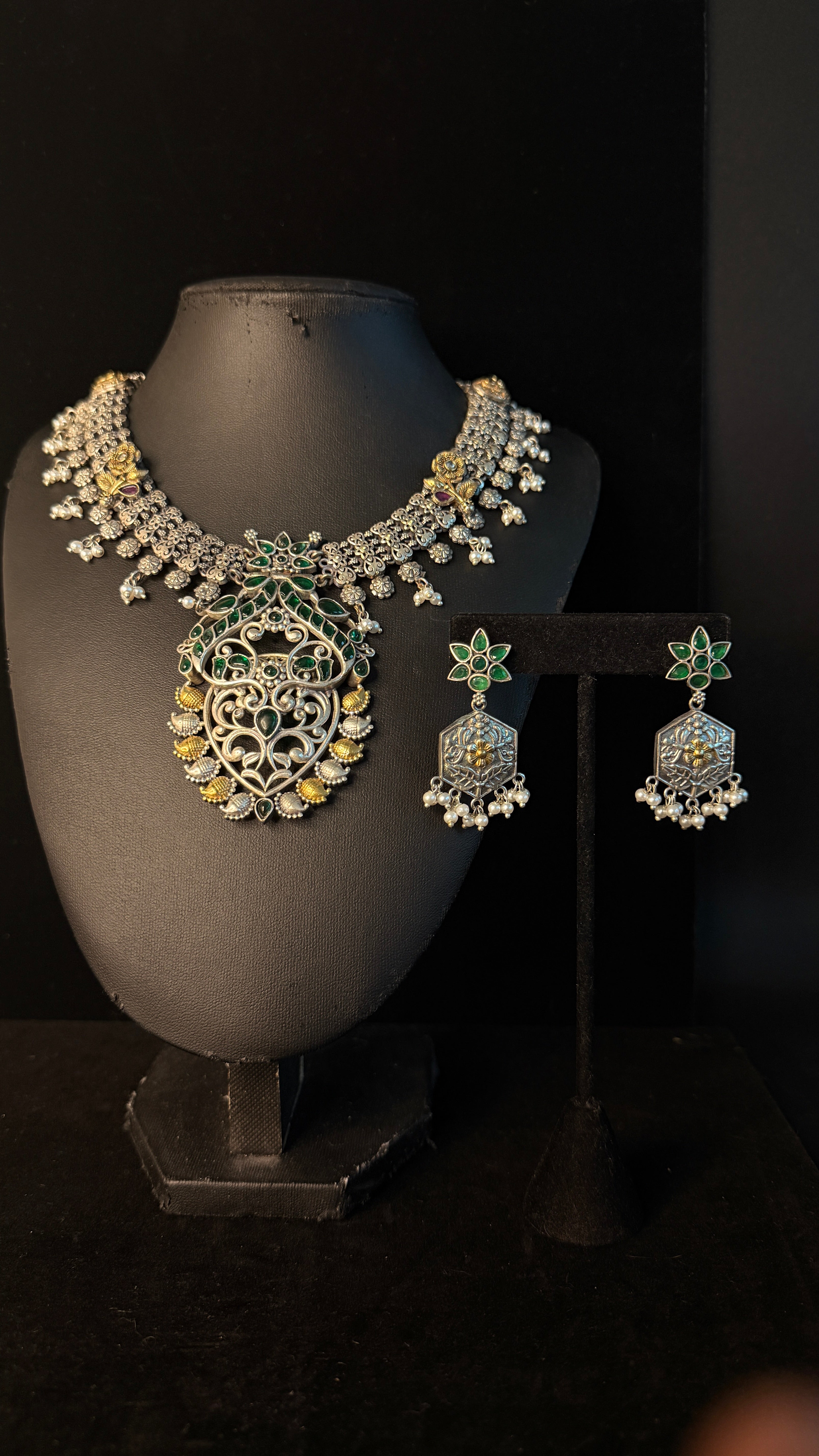 Dual tone necklace with green stones and earring