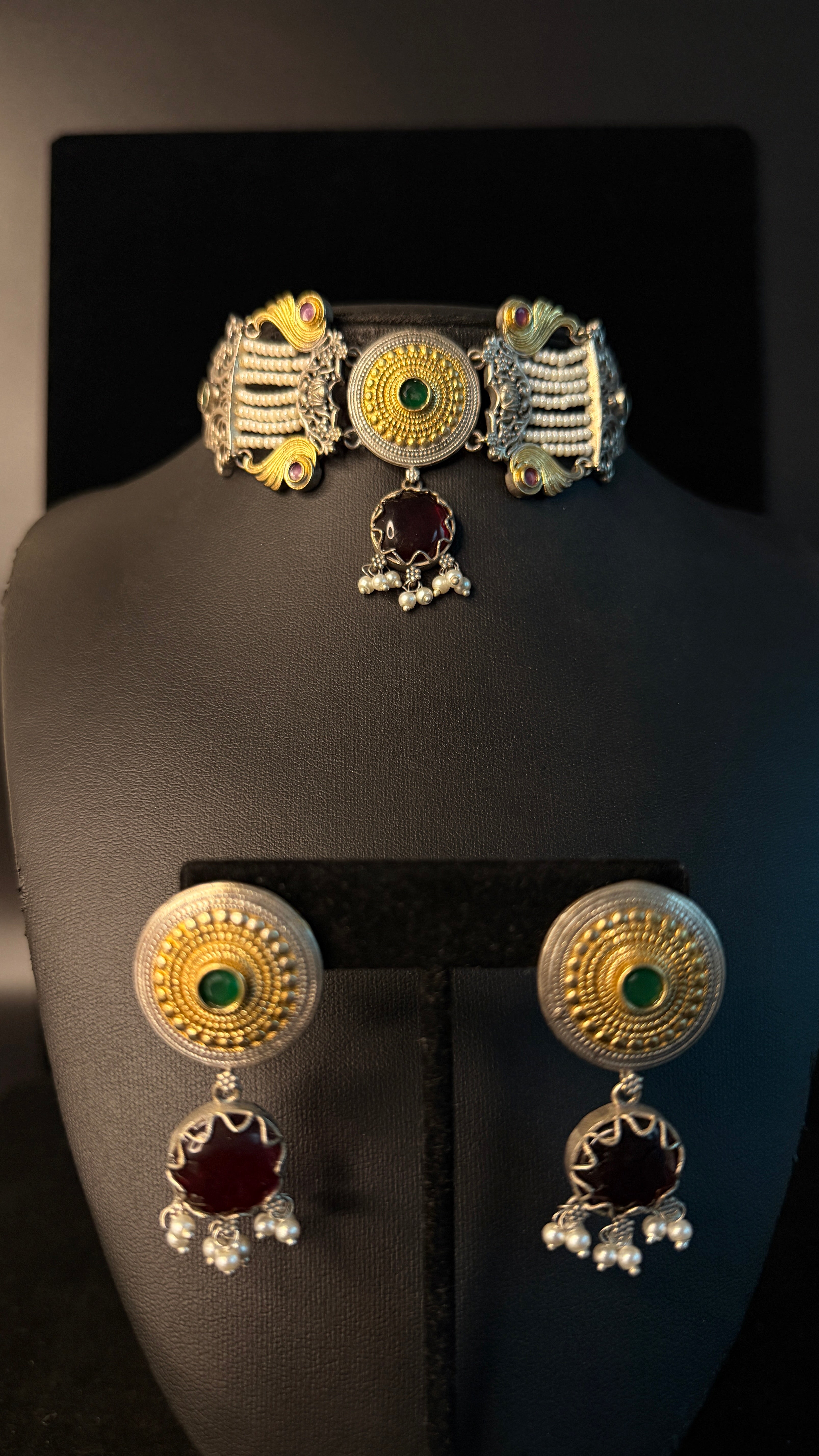 Dual tone choker with green and pink stone
