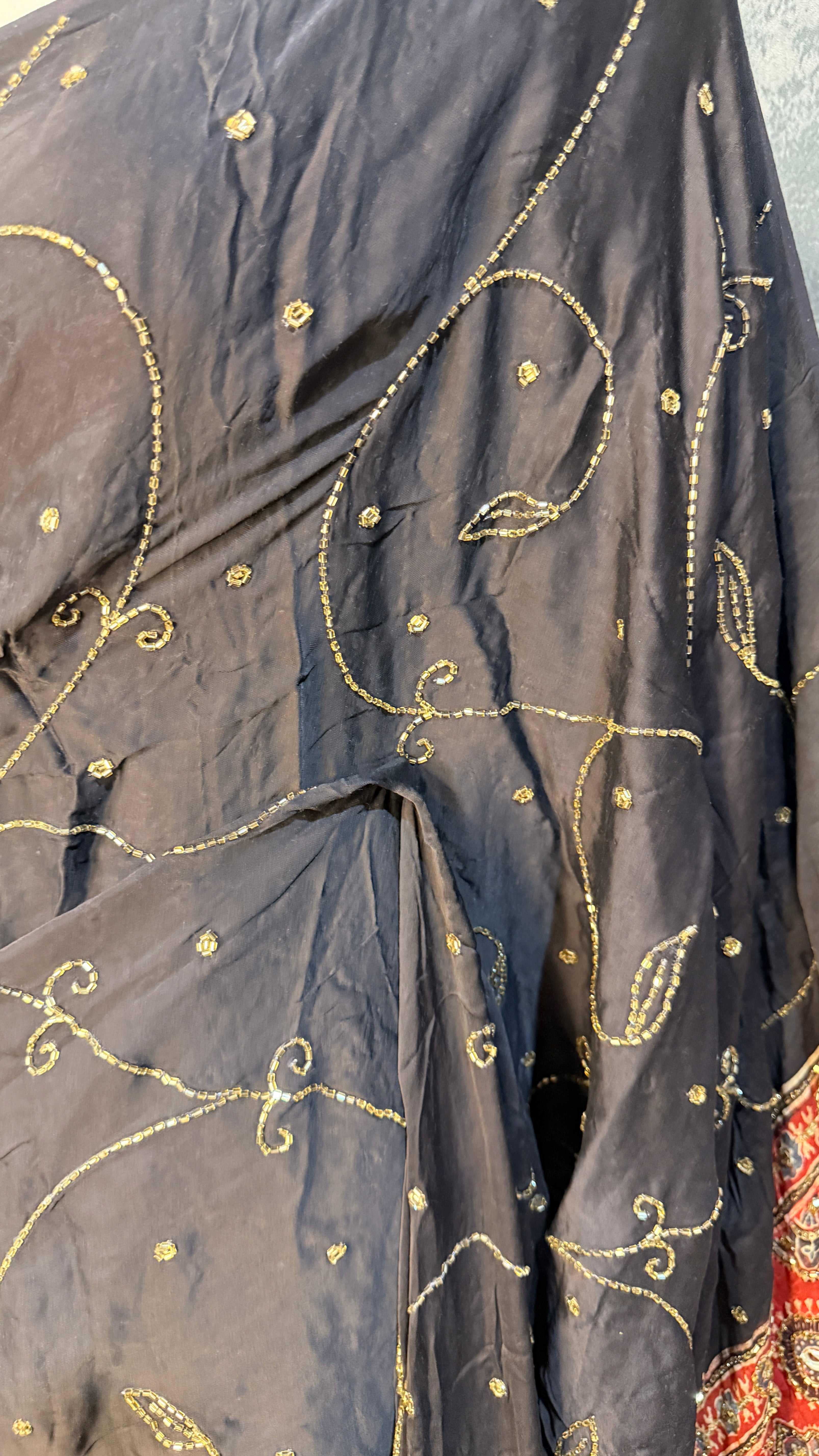 Modal silk saree with bead and mirror work , stitched blouse
