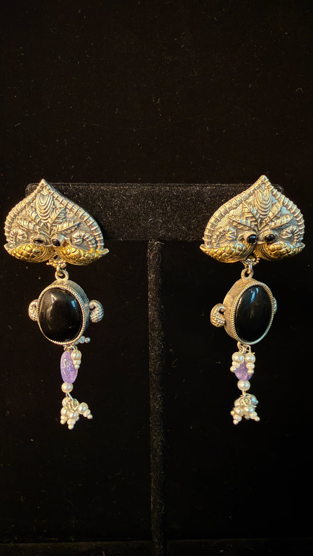 Dual tone necklace with purple stone