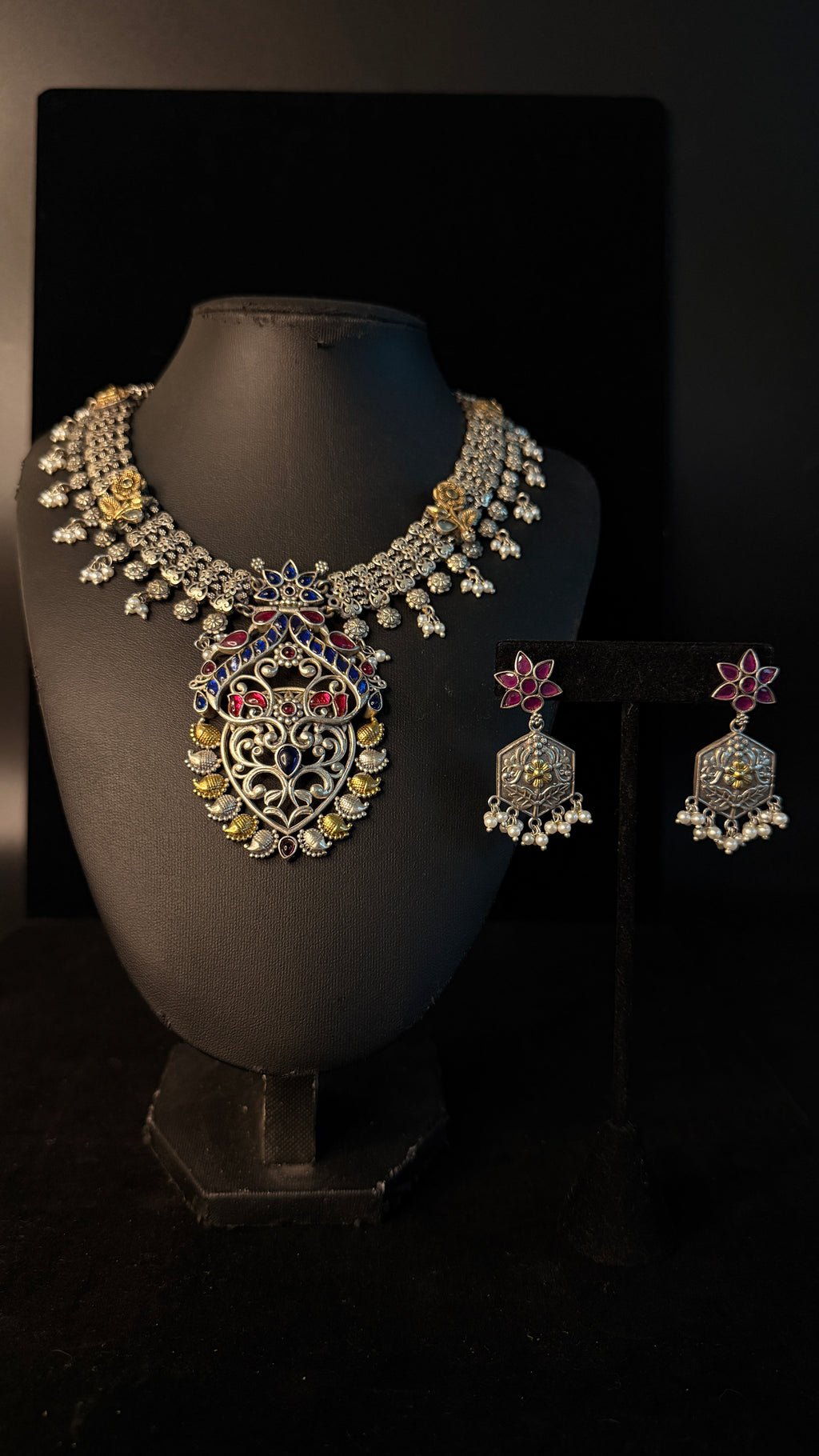 Dual tone necklace with blue and pink stones and earring