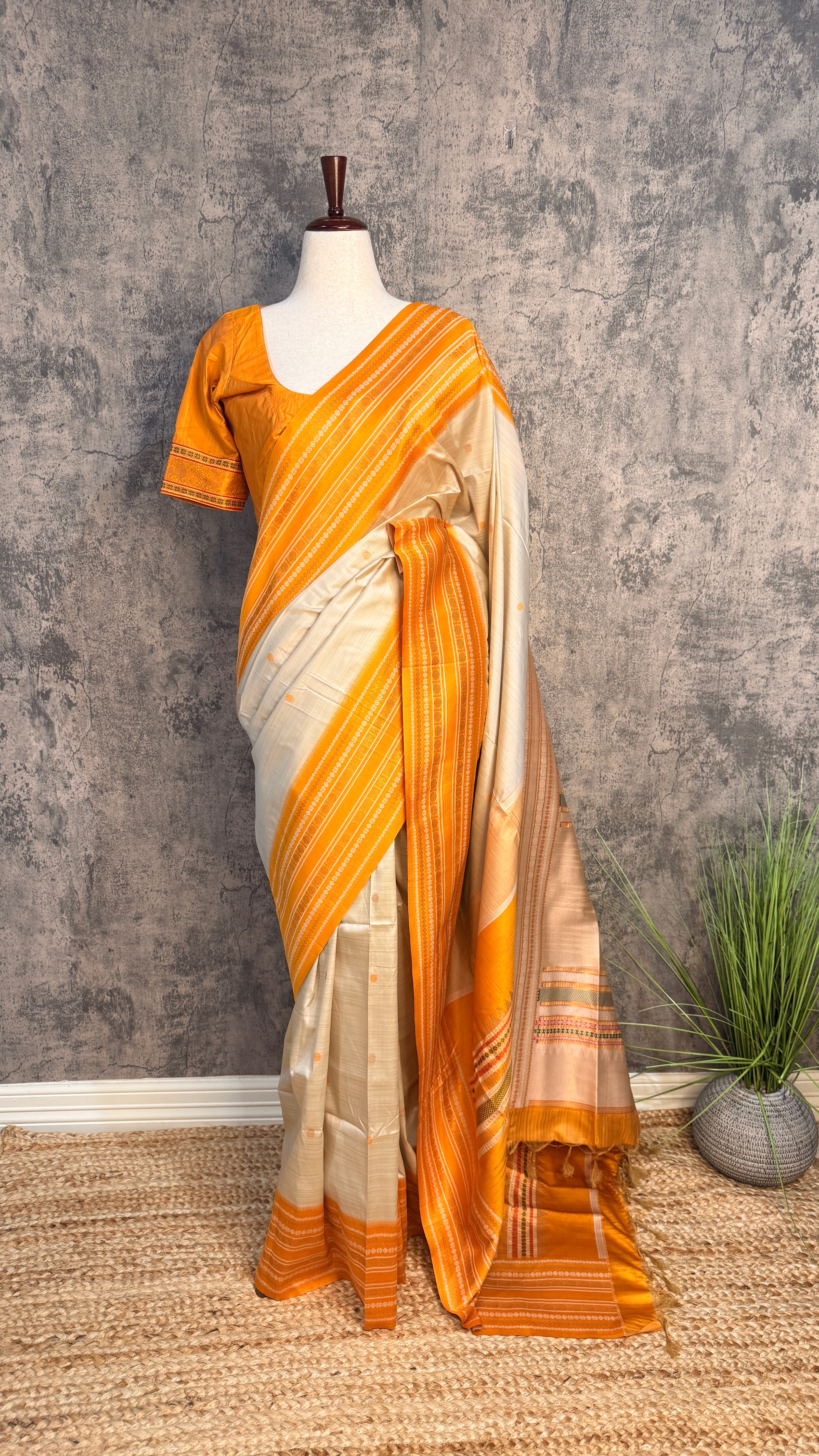 Asam silk saree with green border and stitched blouse