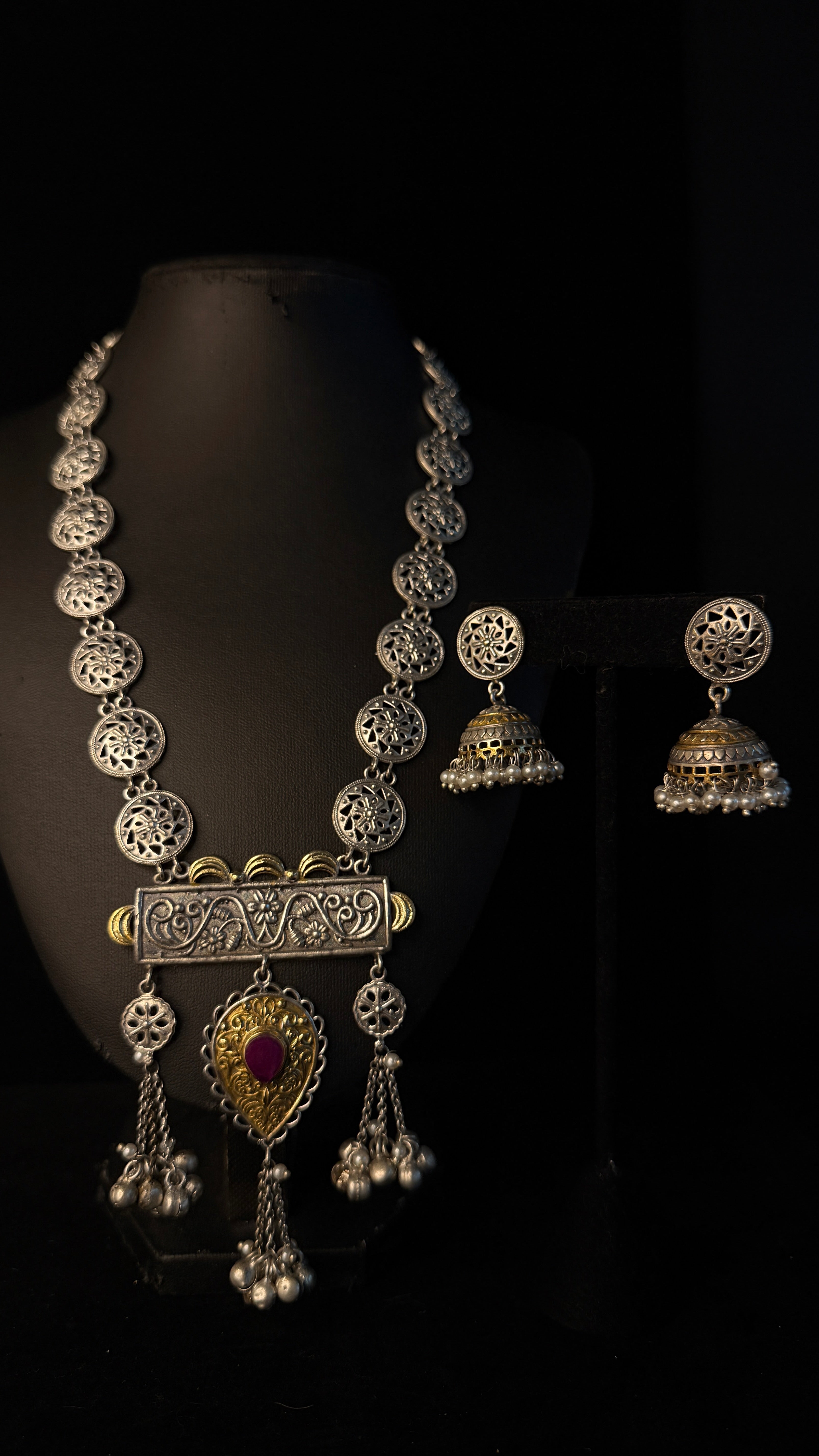 Dual tone necklace with pink stone