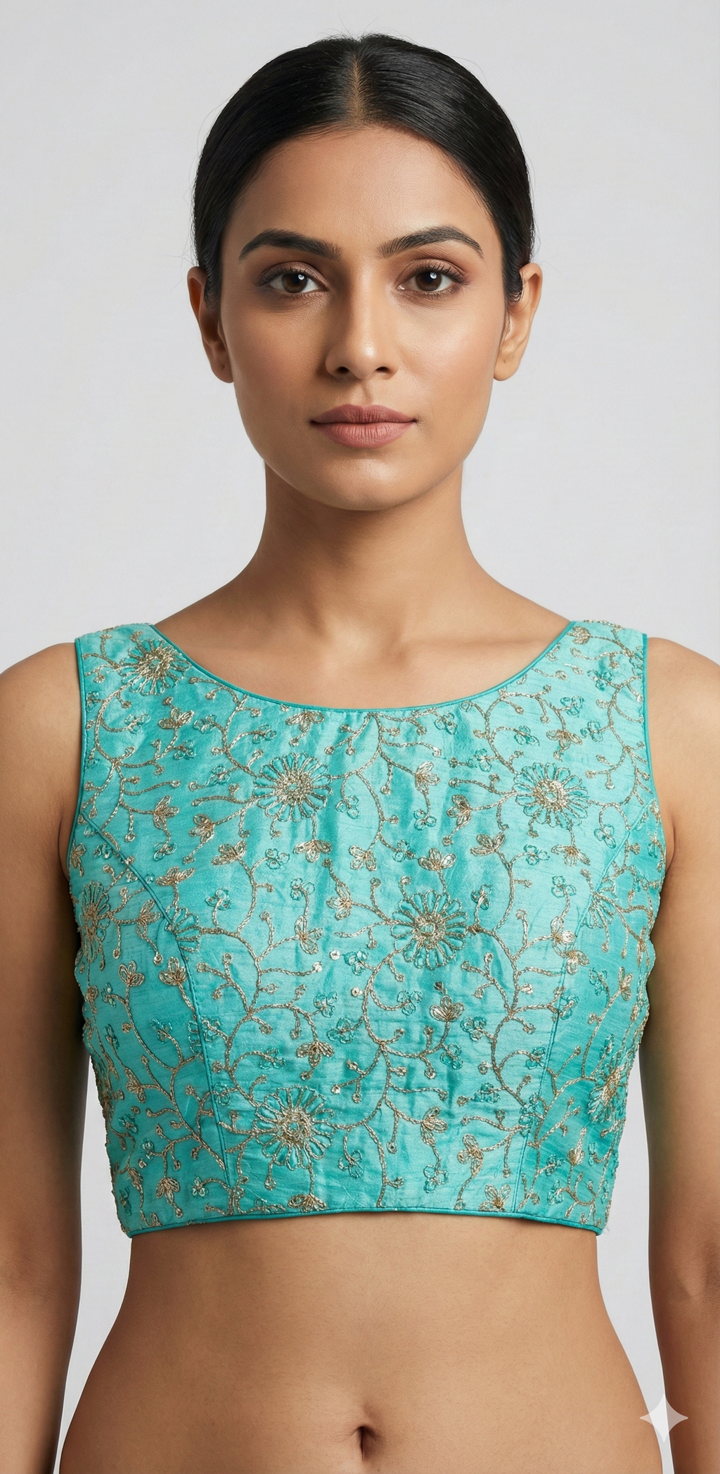 Light blue semi silk sleeveless blouse with emroidery