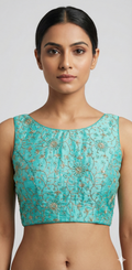 Light blue semi silk sleeveless blouse with emroidery