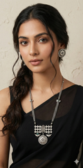 Silver replica necklace and earring - with green stone