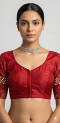 Red patch work blouse with kantha work