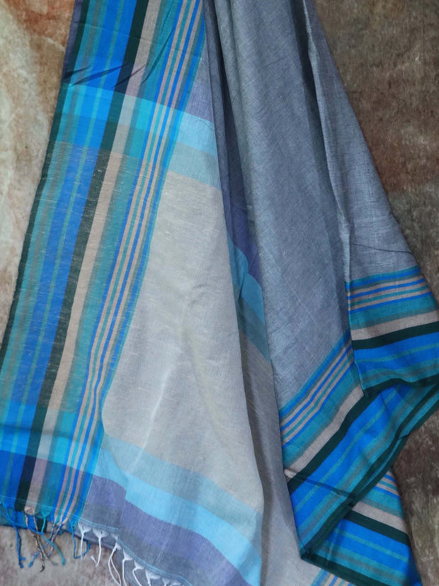 Grey cotton saree, with ikkat silk designer blouse