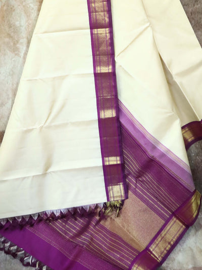 Cream and purple combo kanchipuram silk hand woven saree with stitched blouse